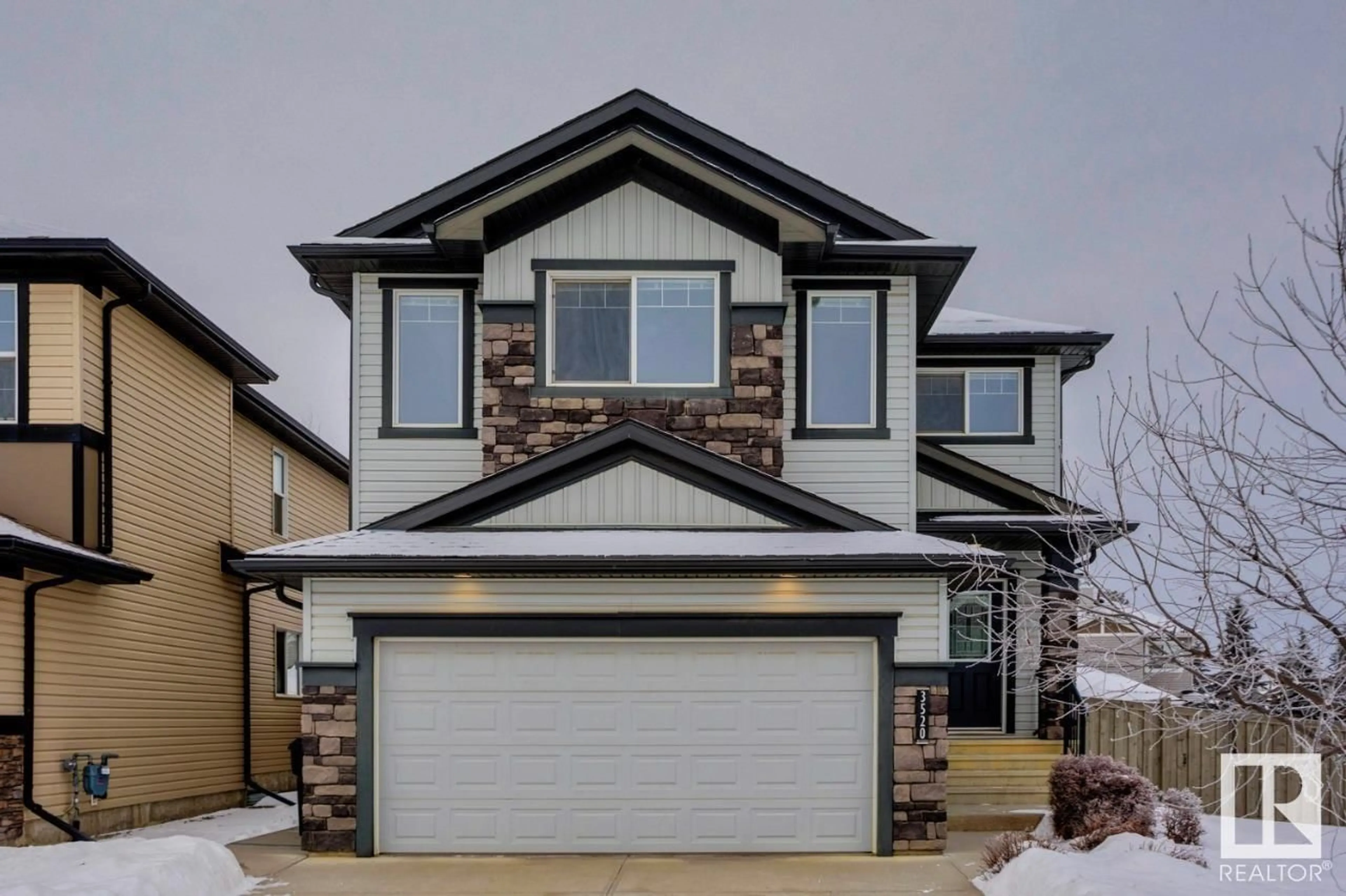 Home with vinyl exterior material, street for 3520 CLAXTON CR SW, Edmonton Alberta T6W0Z6