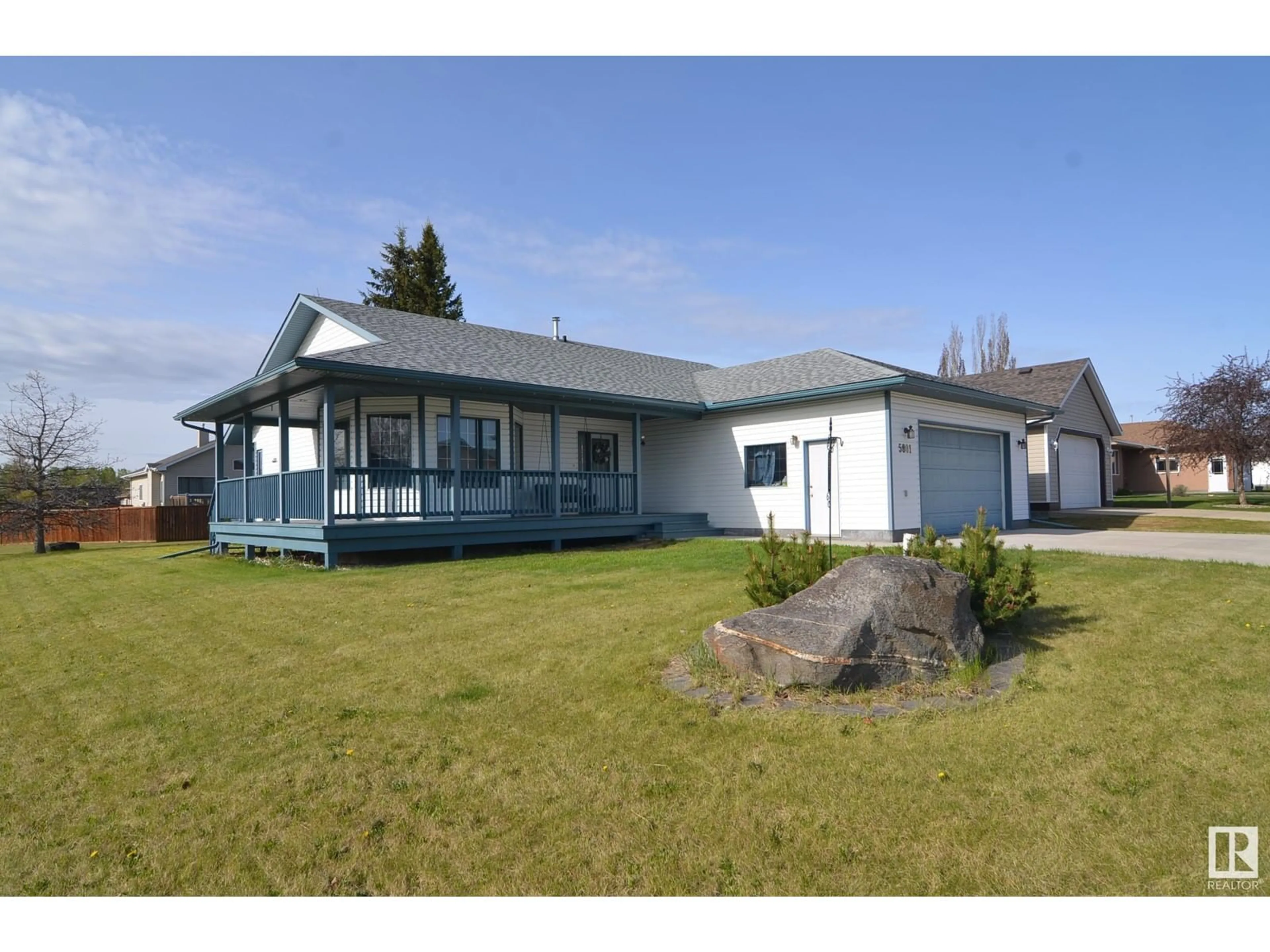 A pic from outside/outdoor area/front of a property/back of a property/a pic from drone, water/lake/river/ocean view for 5803 50 AVE, Barrhead Alberta T7N1N8