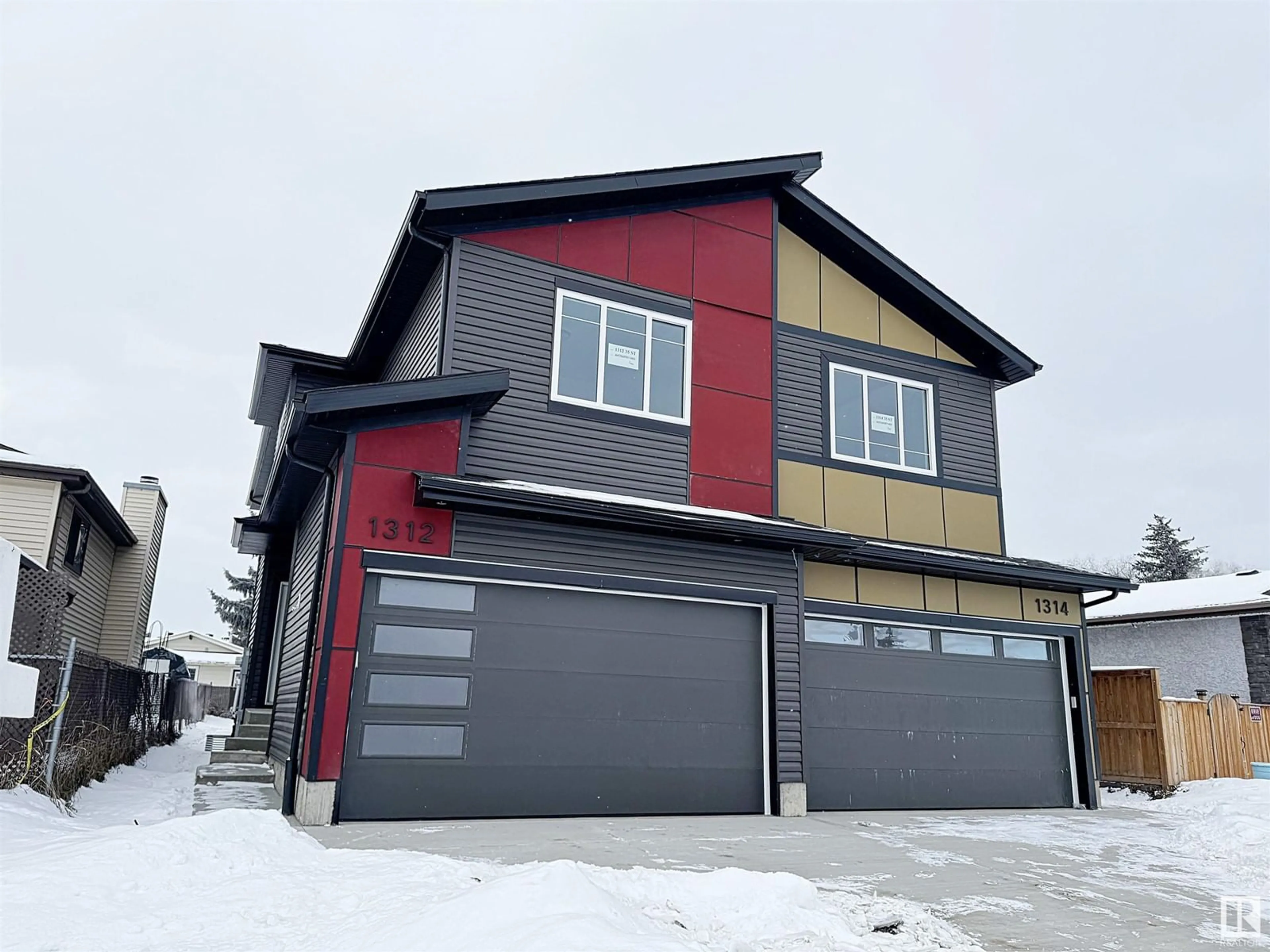 Home with vinyl exterior material, street for 1312 35 ST NW, Edmonton Alberta T6L3E8