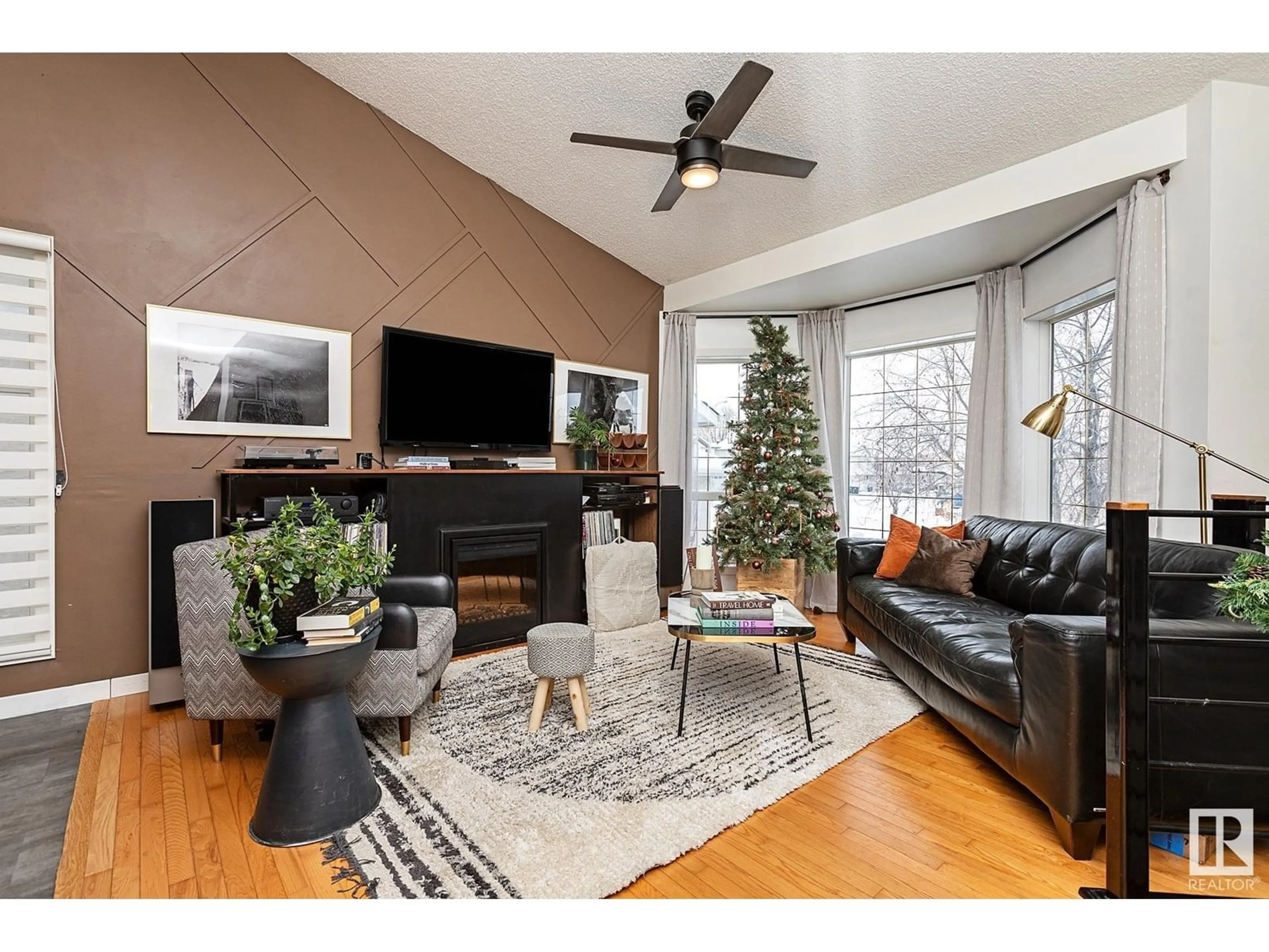 Living room with furniture, wood/laminate floor for 56 FOXHAVEN PL, Sherwood Park Alberta T8A5Y4