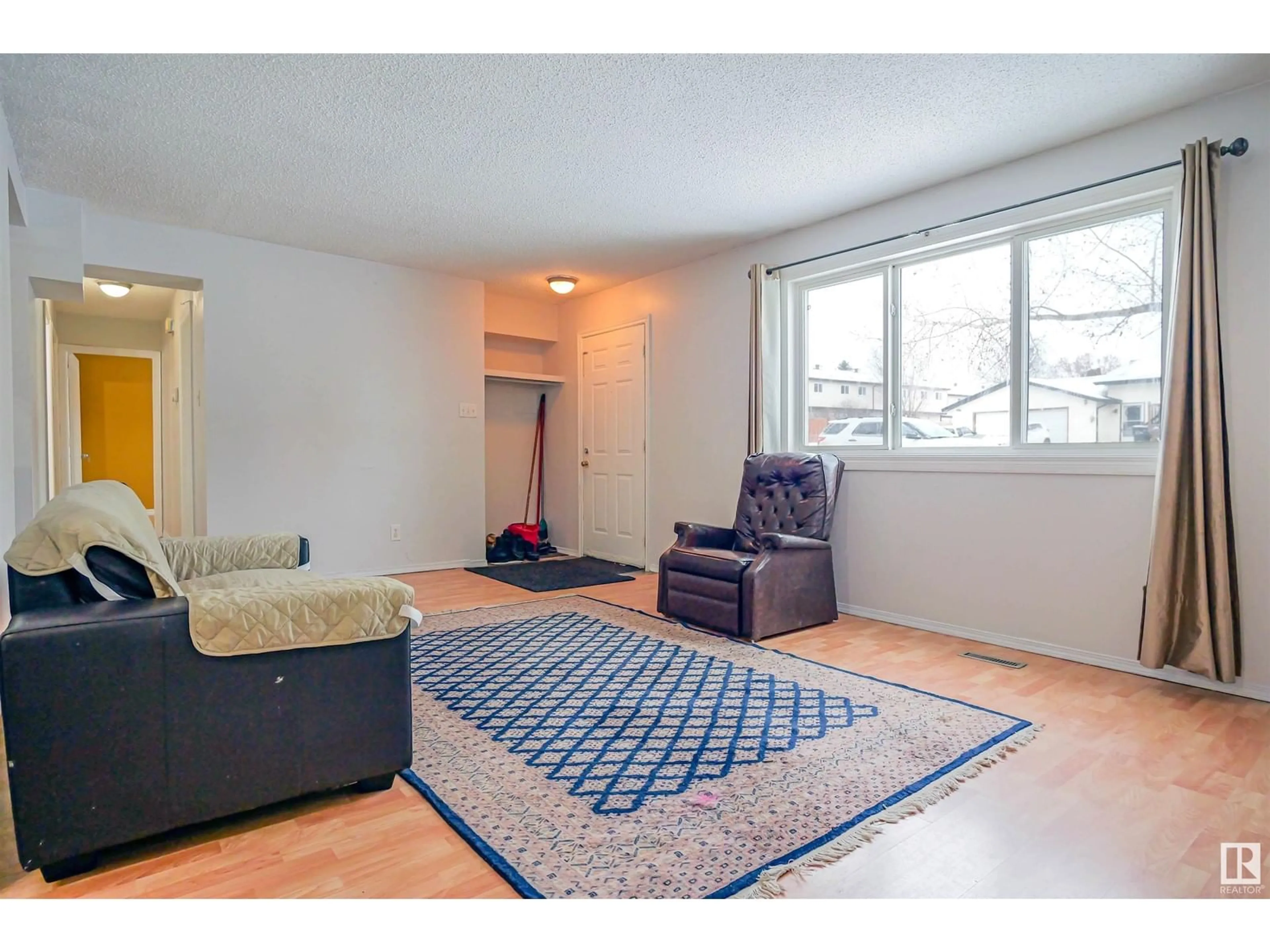 Living room with furniture, unknown for 8437 29 AV NW, Edmonton Alberta T6K3M8