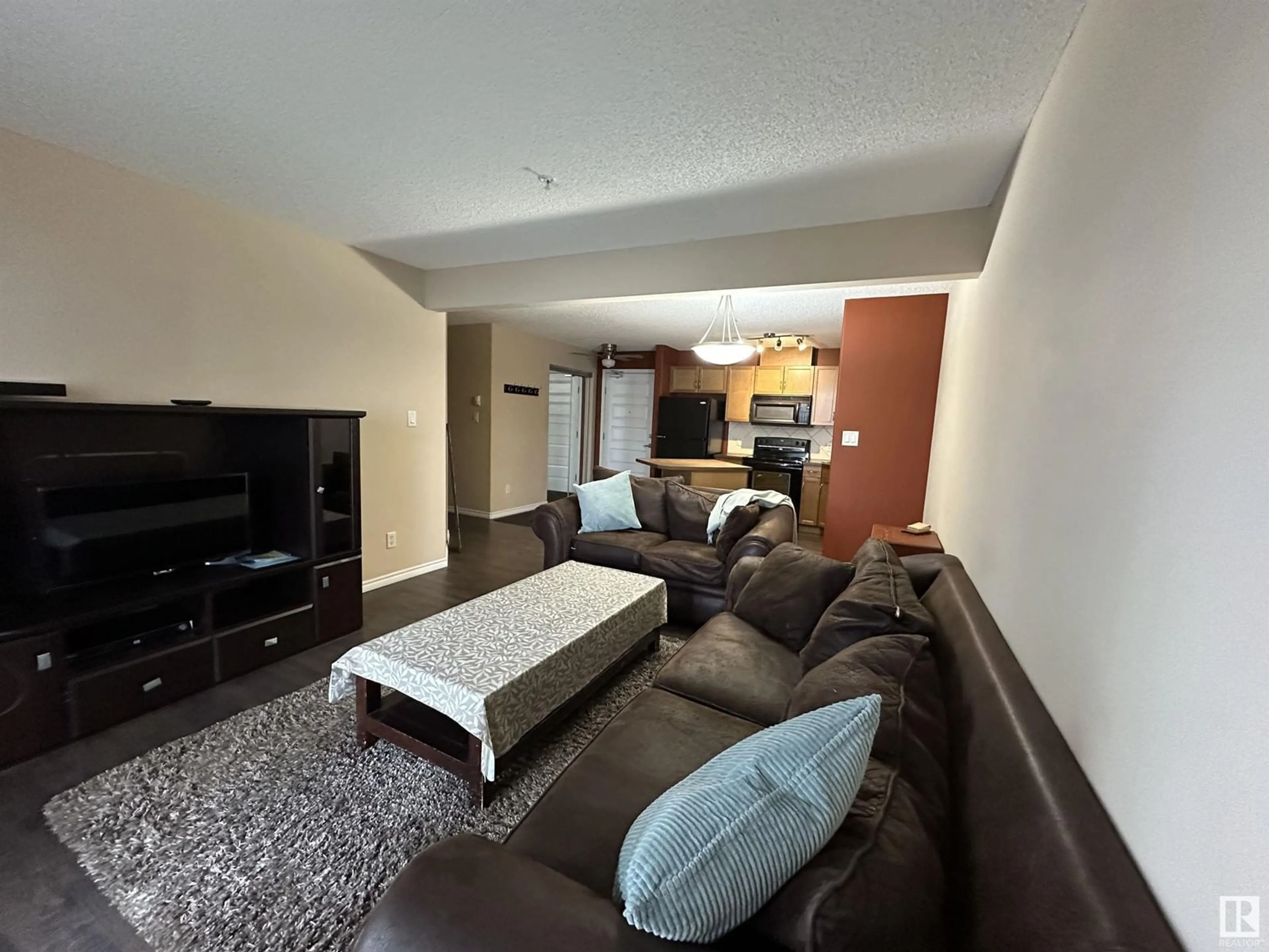 Living room with furniture, unknown for #214 646 MCALLISTER LO SW, Edmonton Alberta T6W0B5