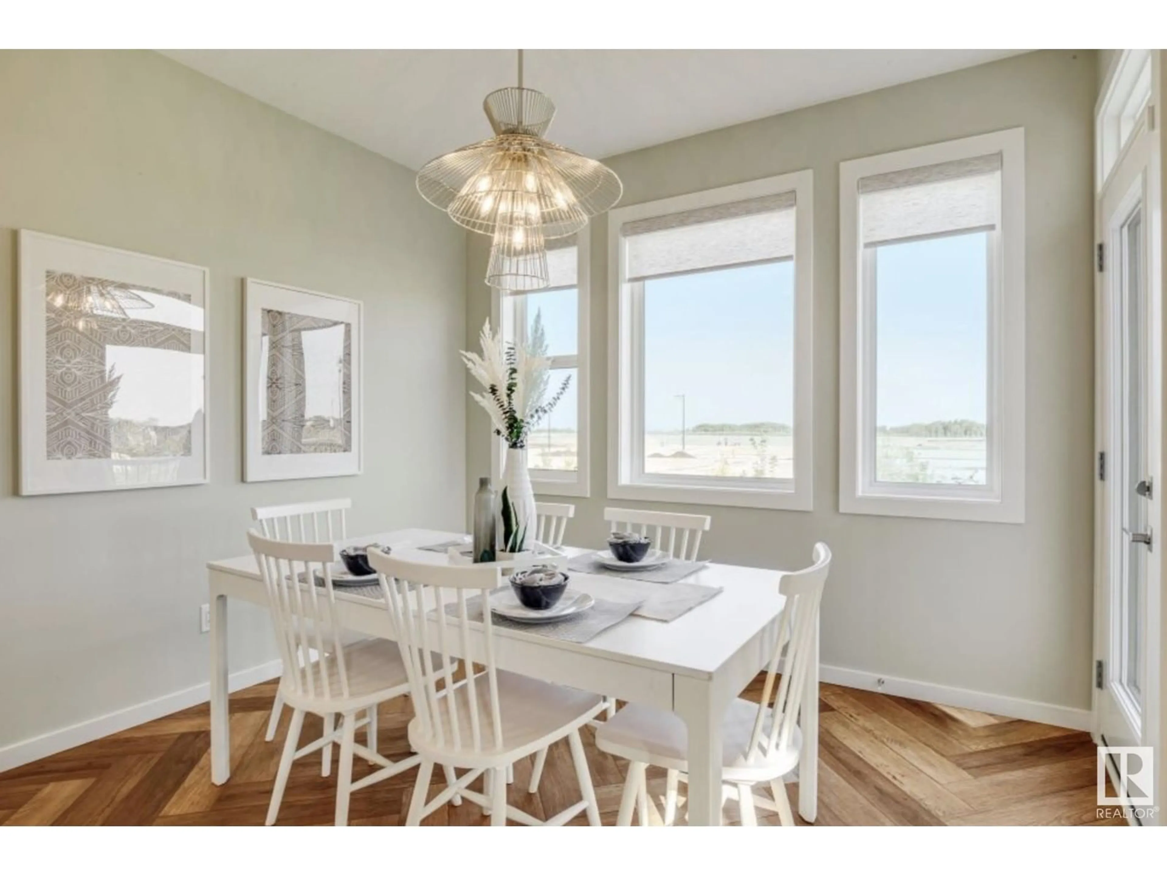 Dining room, wood/laminate floor for 2235 194 ST NW, Edmonton Alberta T6M3B6