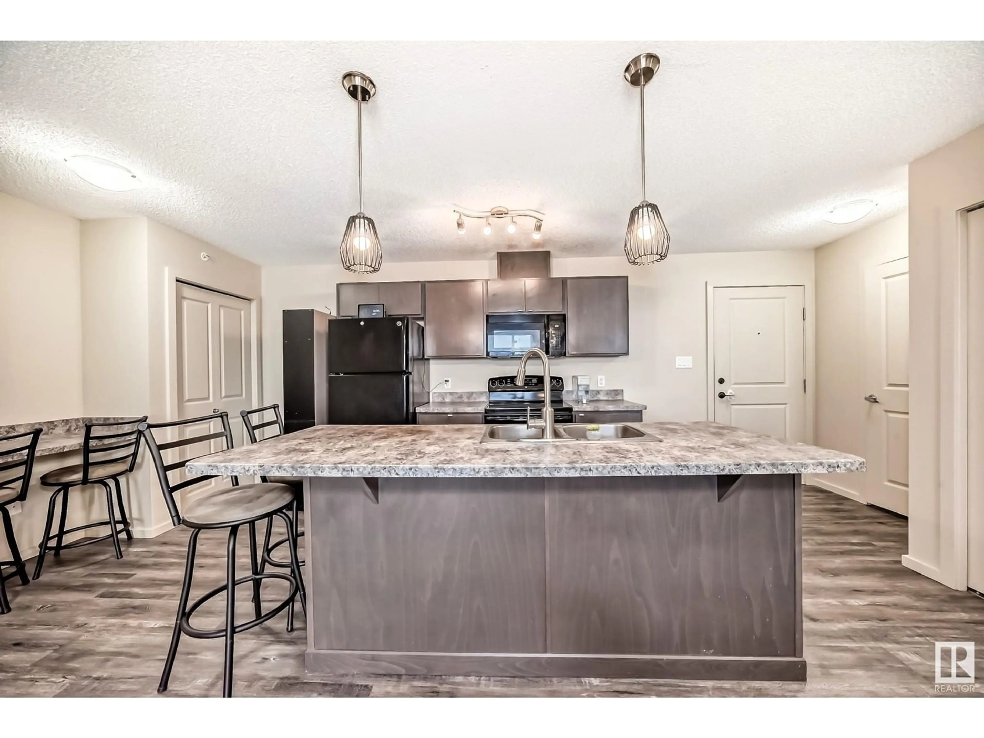 Open concept kitchen, unknown for #461 1196 HYNDMAN RD NW, Edmonton Alberta T5A0P8