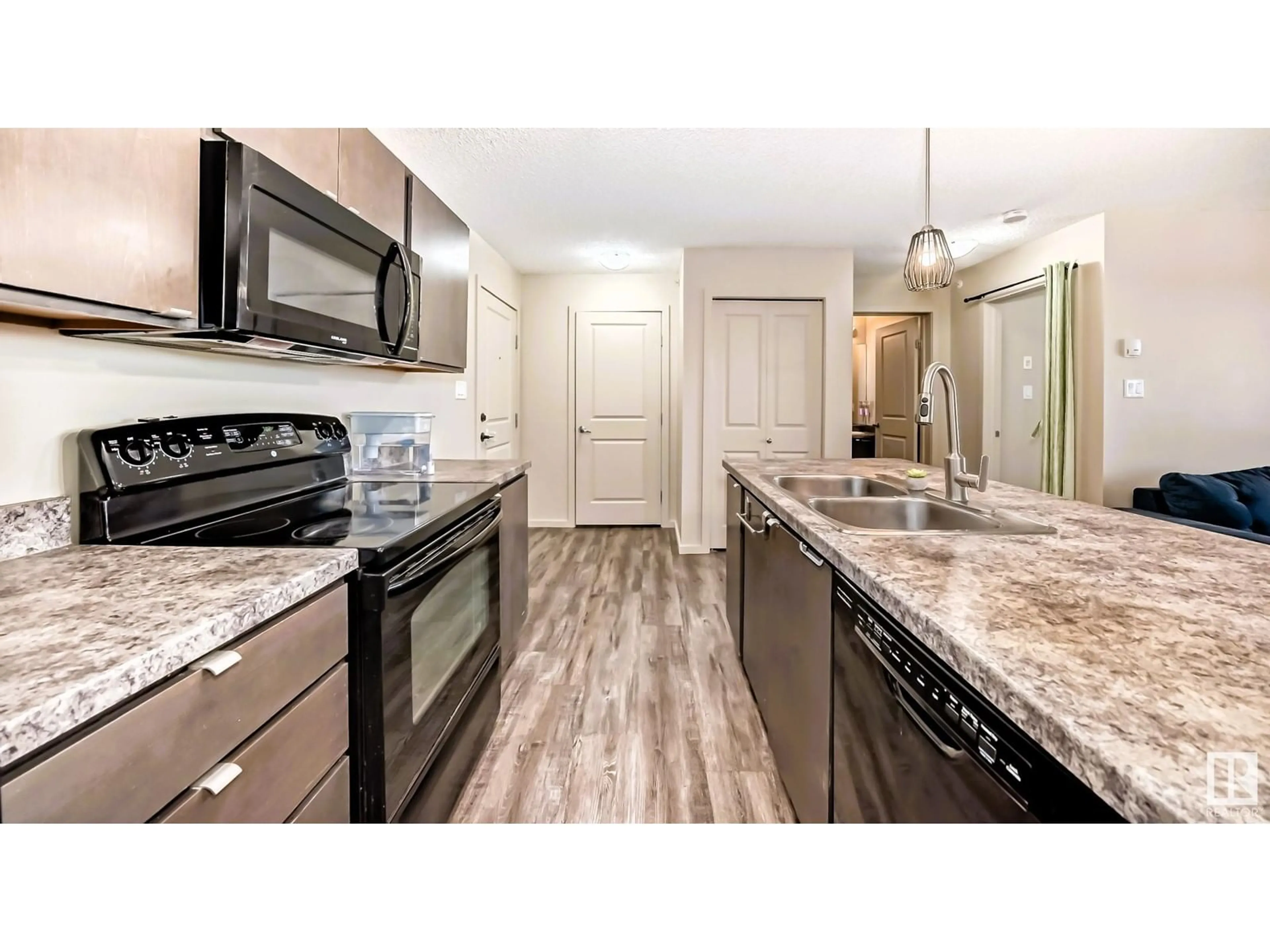 Open concept kitchen, unknown for #461 1196 HYNDMAN RD NW, Edmonton Alberta T5A0P8