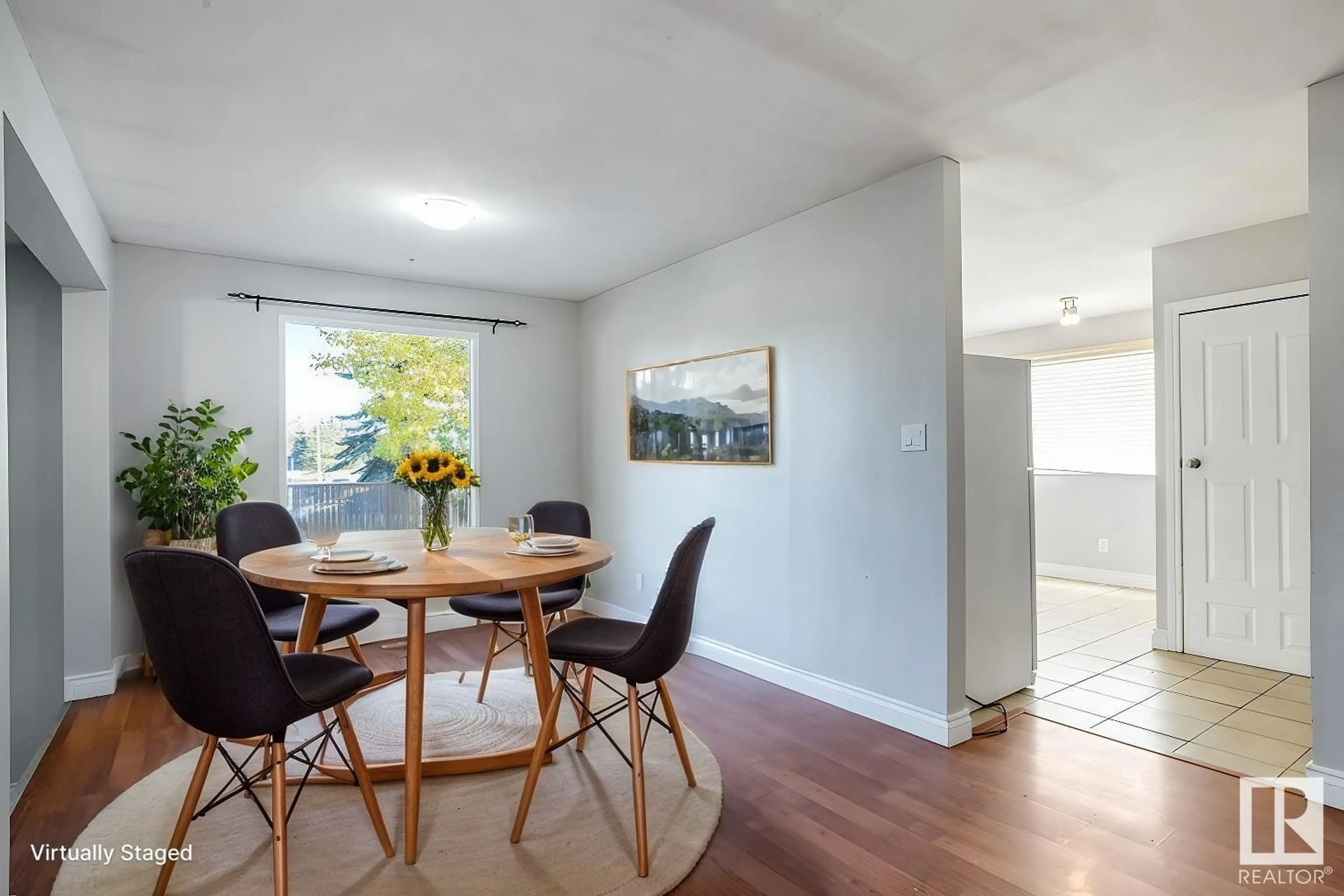 Dining room, wood/laminate floor for 11940 152B AV NW, Edmonton Alberta T5X1G4