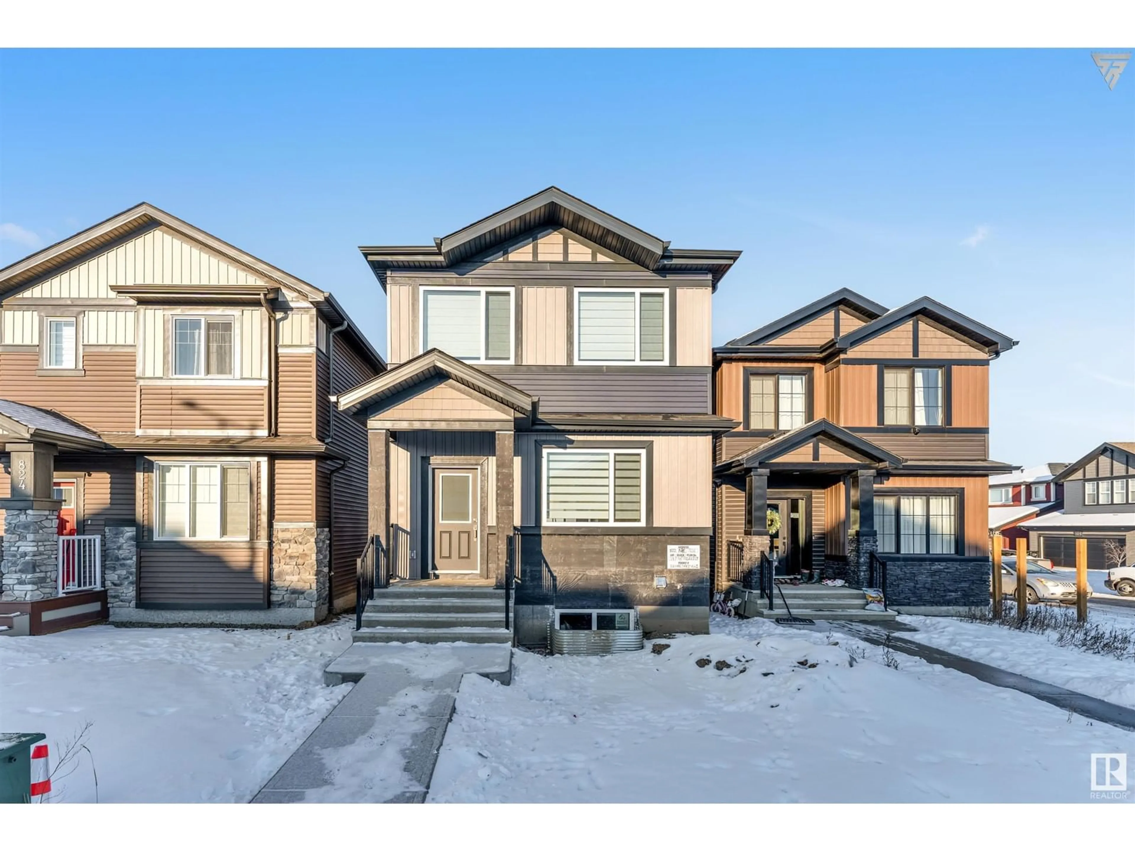 Home with brick exterior material, street for 822 Northern Harrier LN NW, Edmonton Alberta T5S2B9