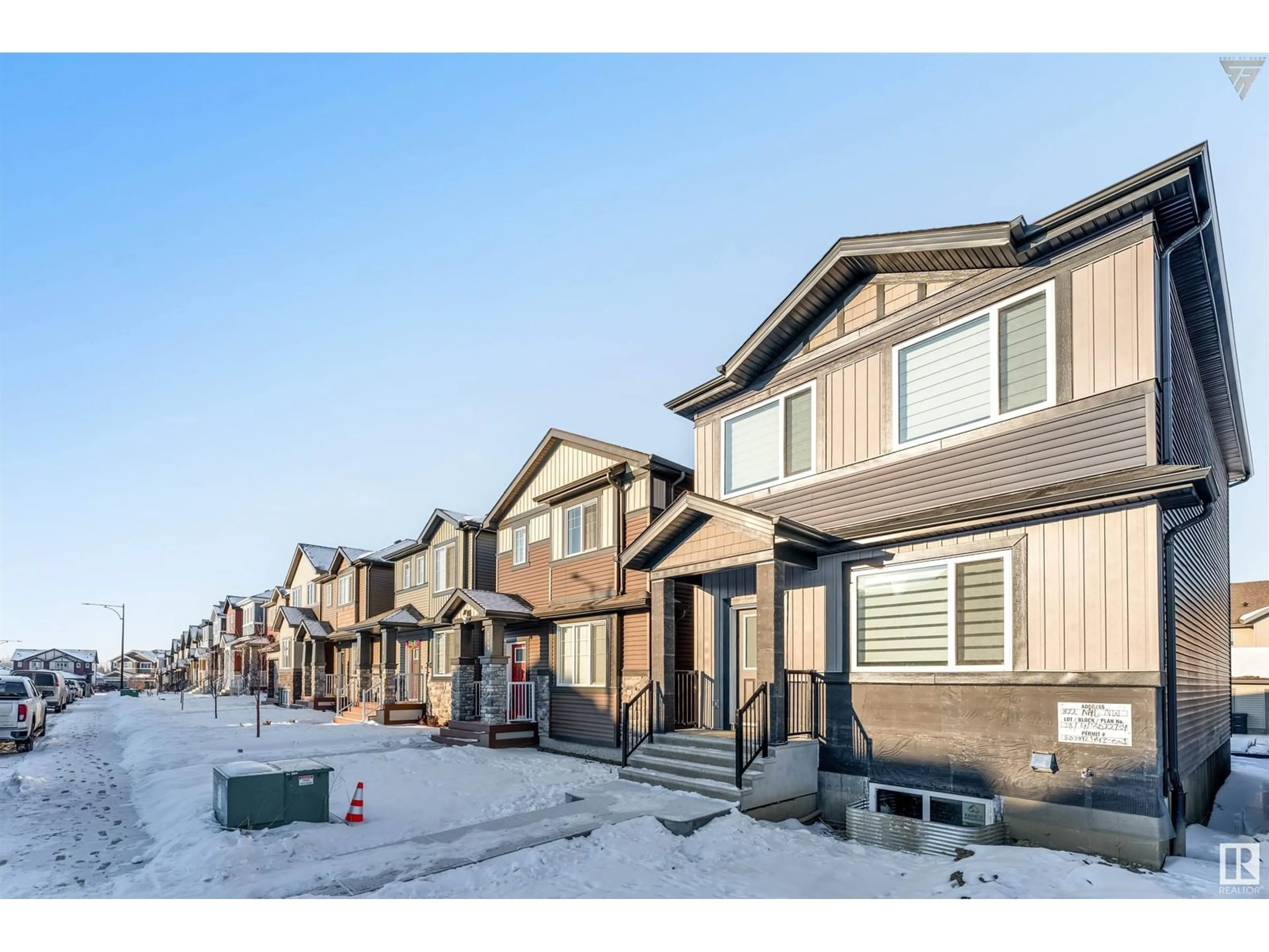 A pic from outside/outdoor area/front of a property/back of a property/a pic from drone, street for 822 Northern Harrier LN NW, Edmonton Alberta T5S2B9