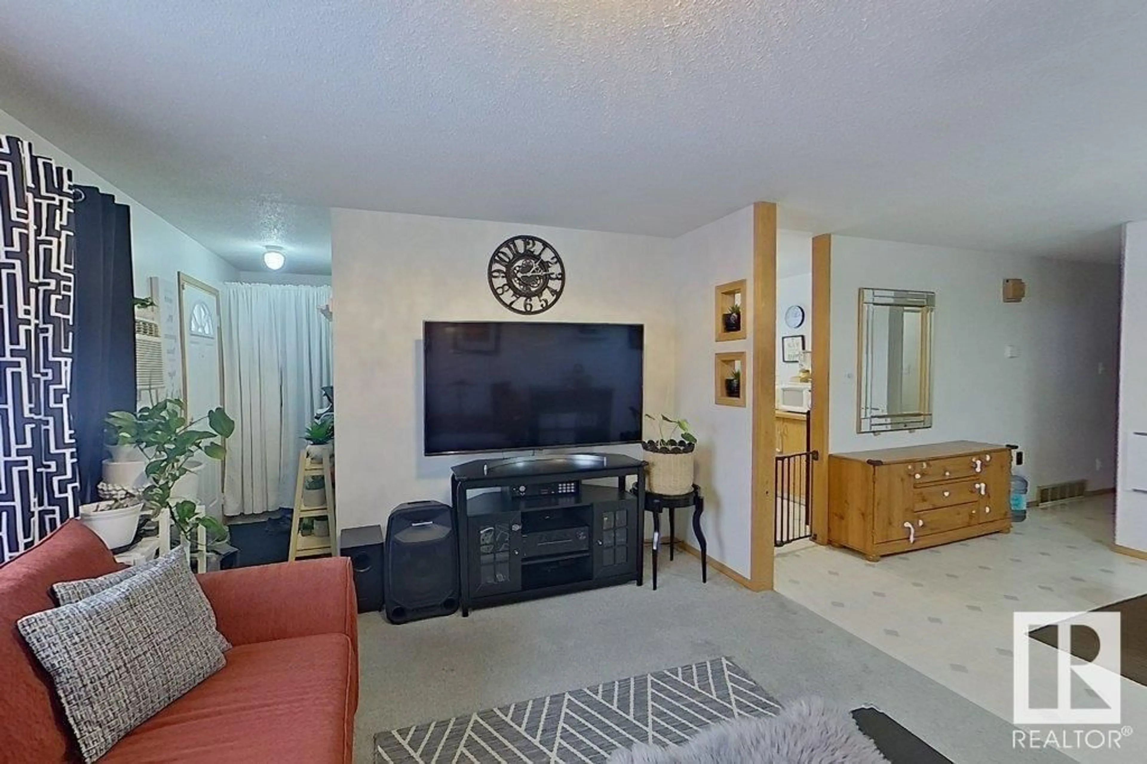 Living room with furniture, unknown for 9422 132 AV NW, Edmonton Alberta T5E0Y3