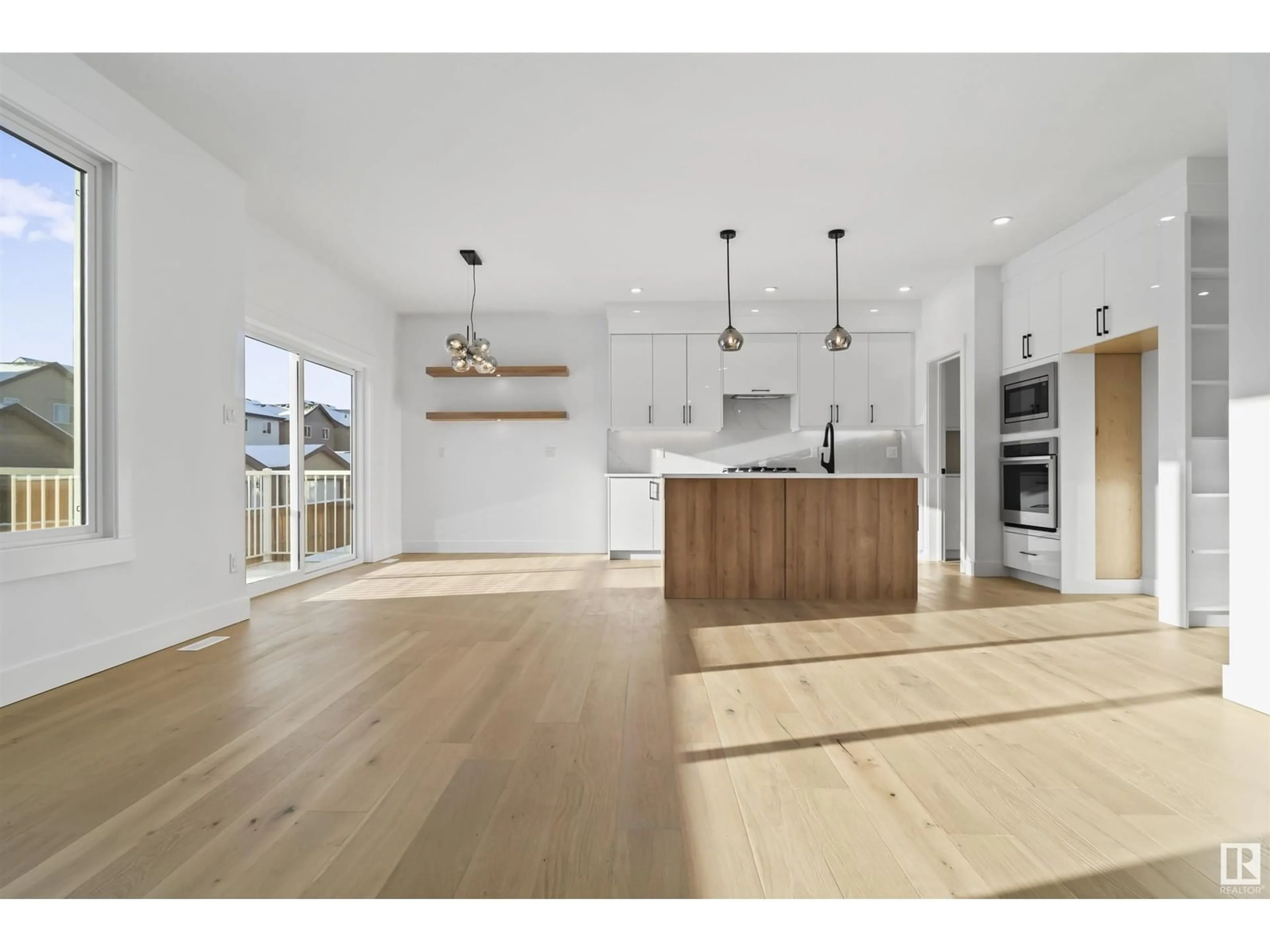 Open concept kitchen, wood/laminate floor for 4743 ALWOOD BEND BN SW, Edmonton Alberta T6W3A2