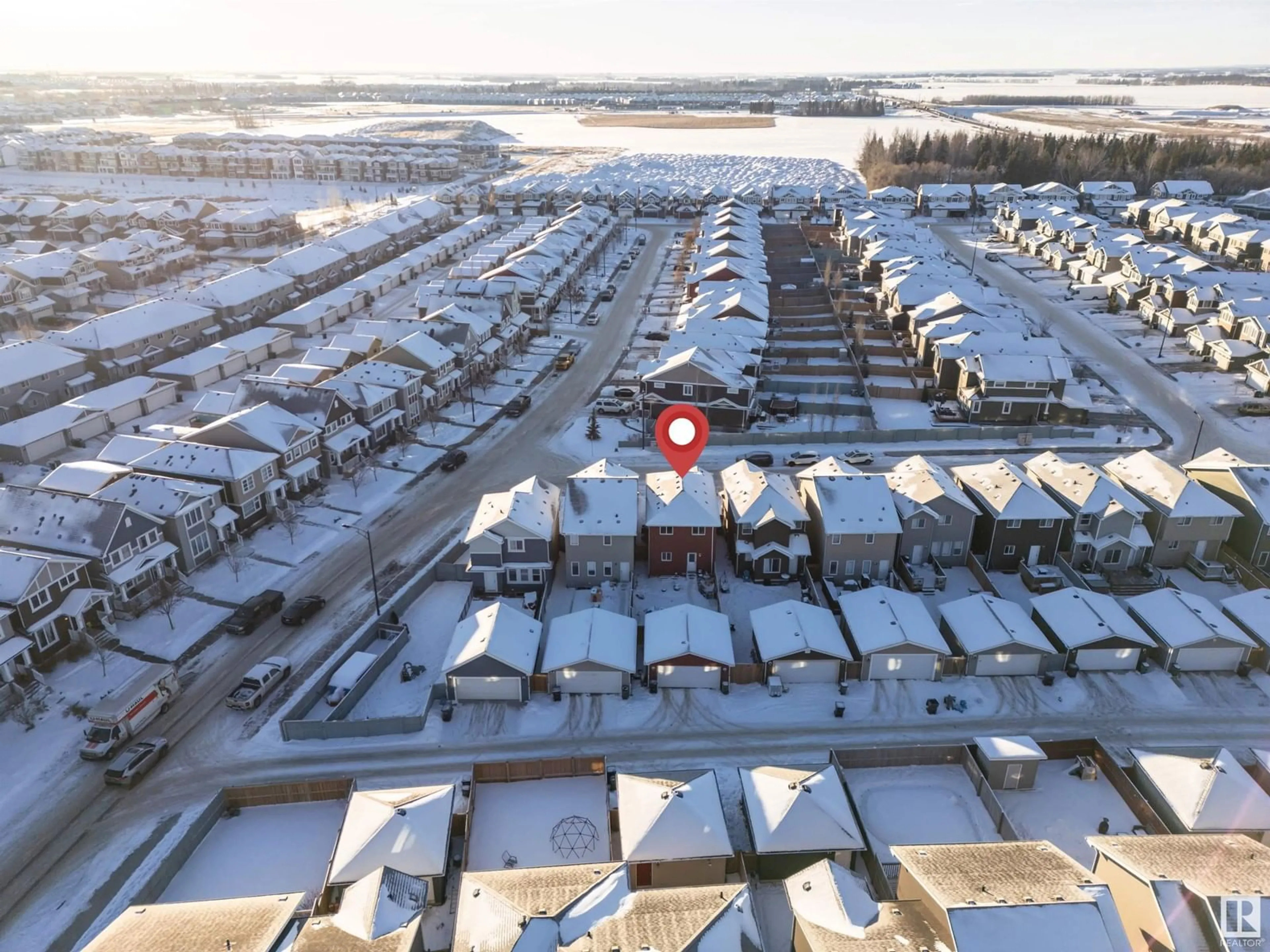 A pic from outside/outdoor area/front of a property/back of a property/a pic from drone, street for 16712 15 AV SW, Edmonton Alberta T6W3C4