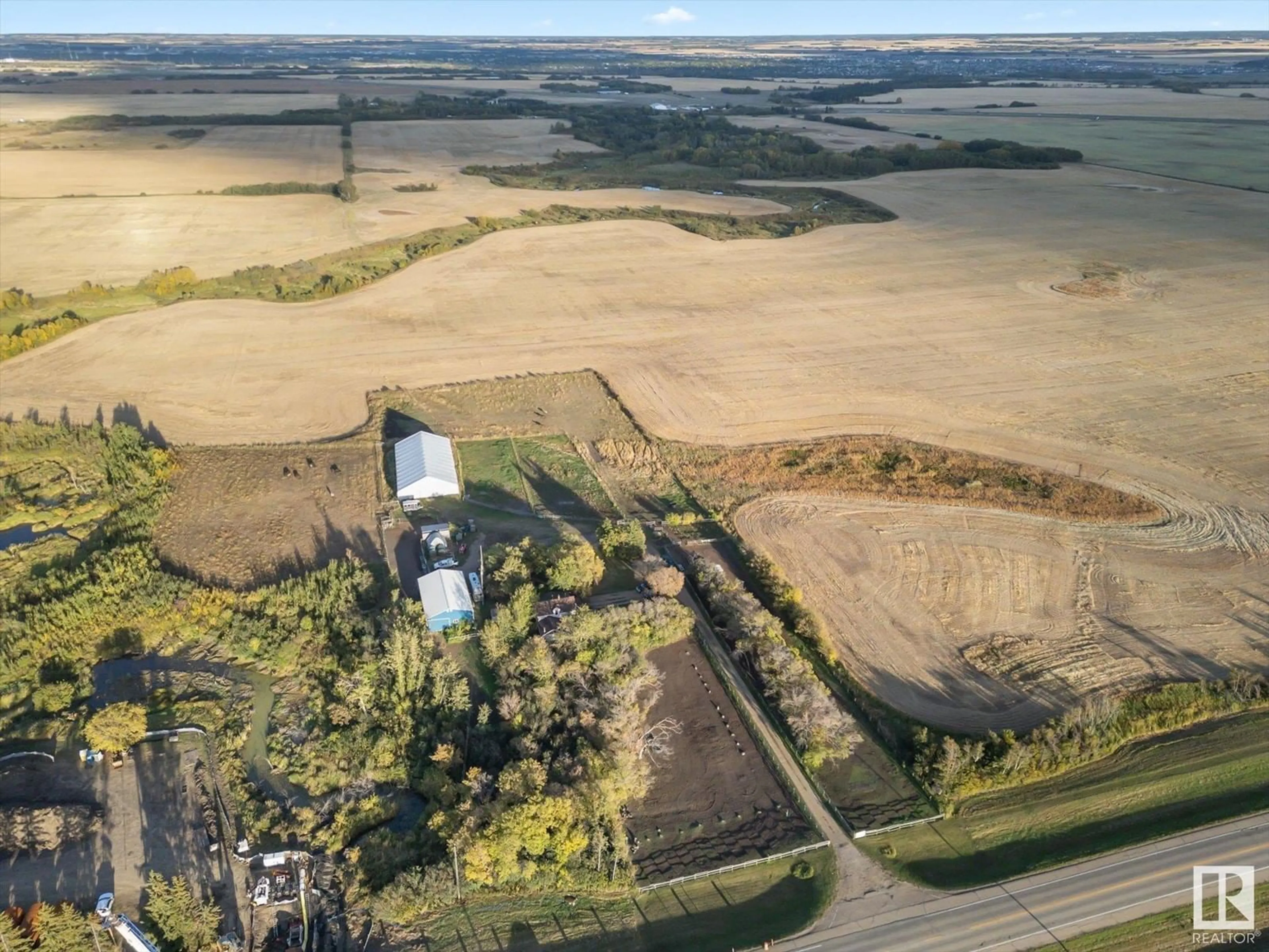 A pic from outside/outdoor area/front of a property/back of a property/a pic from drone, building for 25021 17 ST NE, Edmonton Alberta T5Y6J5