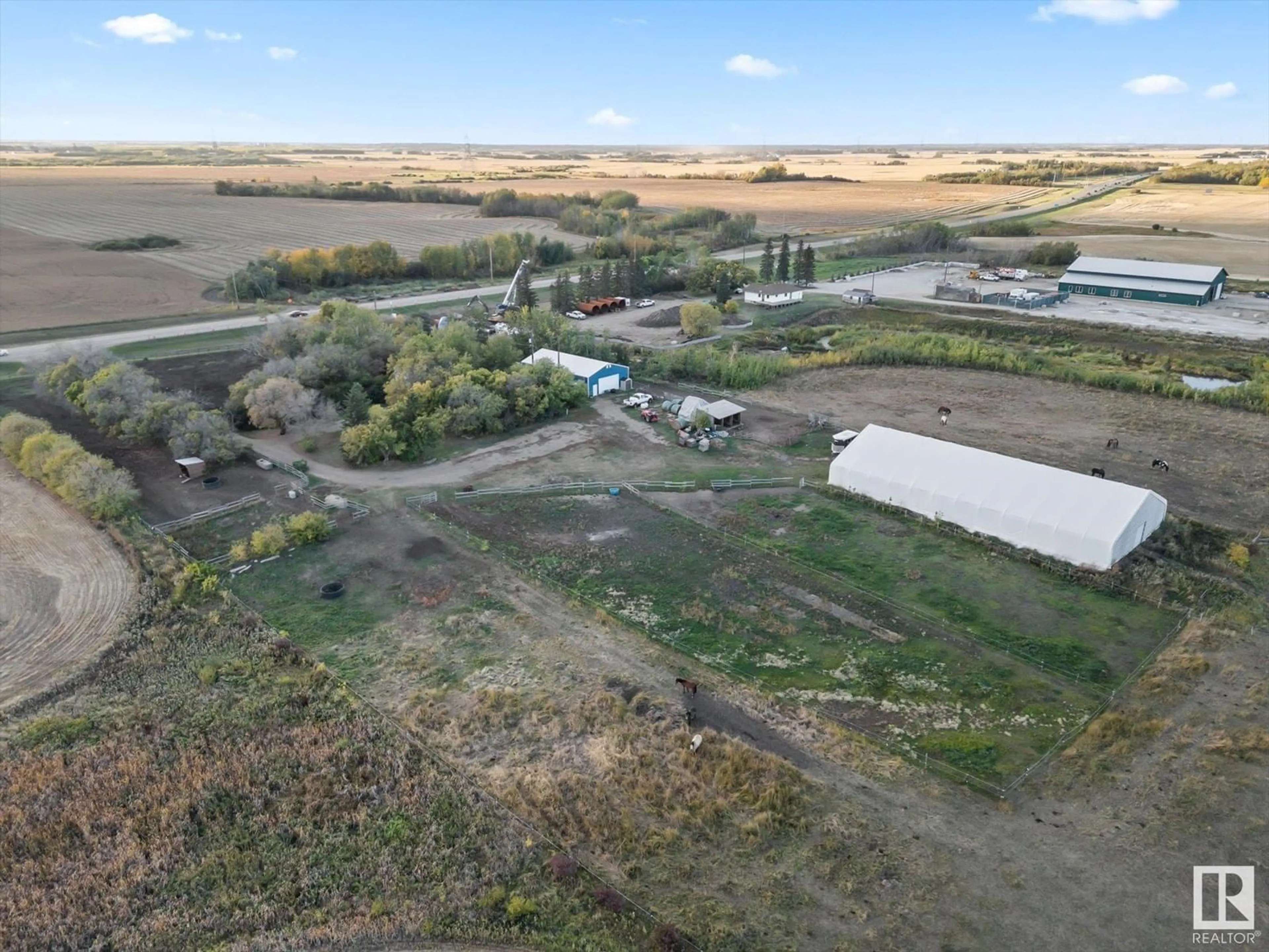 A pic from outside/outdoor area/front of a property/back of a property/a pic from drone, unknown for 25021 17 ST NE, Edmonton Alberta T5Y6J5