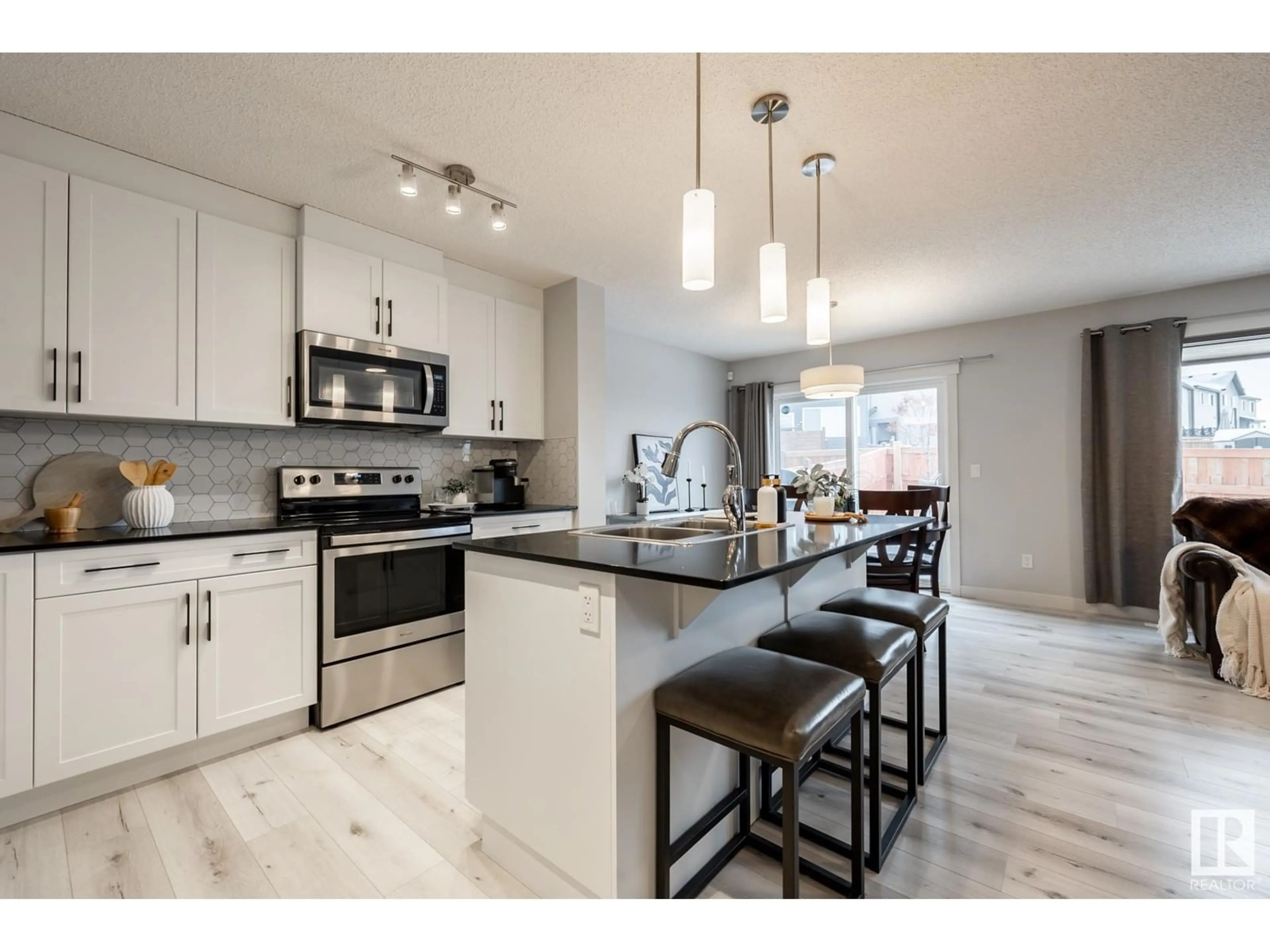 Open concept kitchen, ceramic/tile floor for 4015 KINSELLA WY SW, Edmonton Alberta T6W4J5