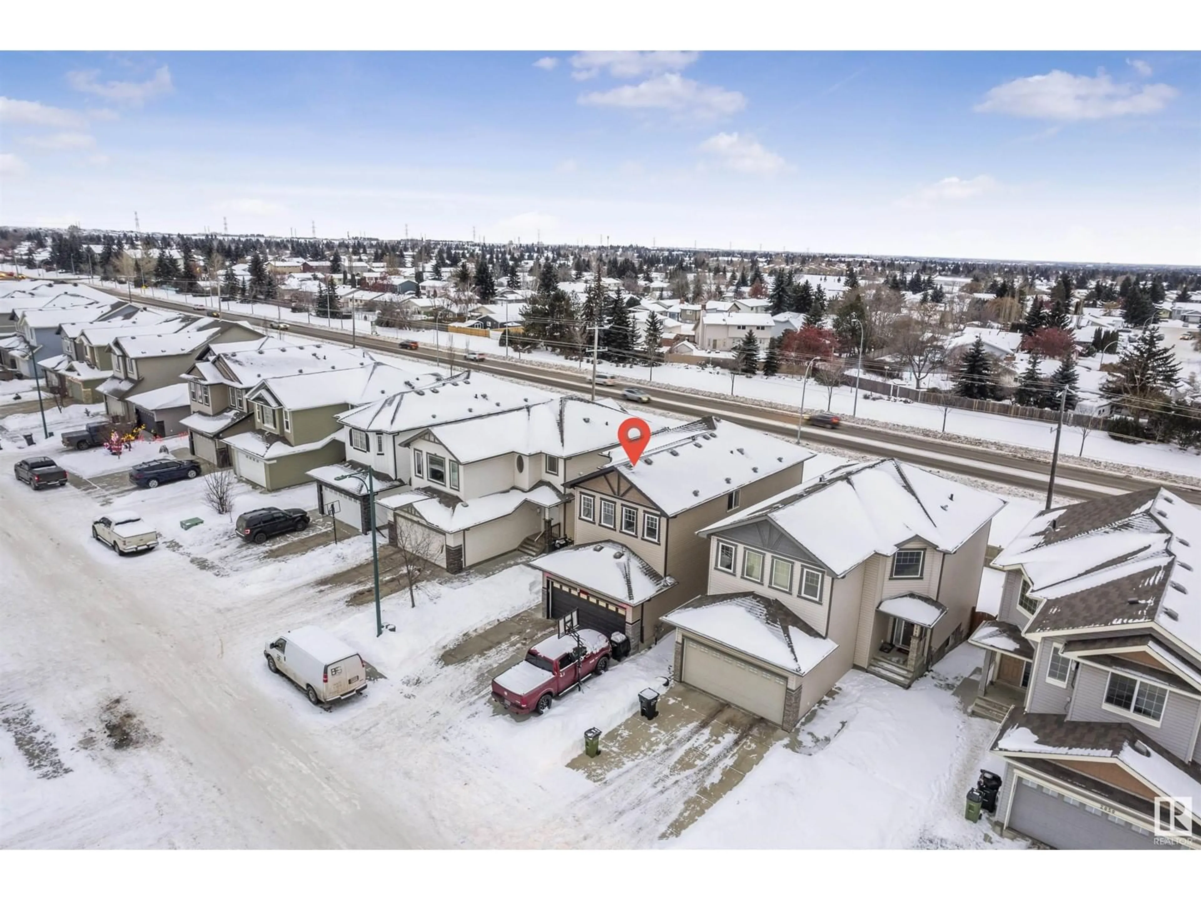 A pic from outside/outdoor area/front of a property/back of a property/a pic from drone, street for 2038 33B ST NW NW, Edmonton Alberta T6T0L3