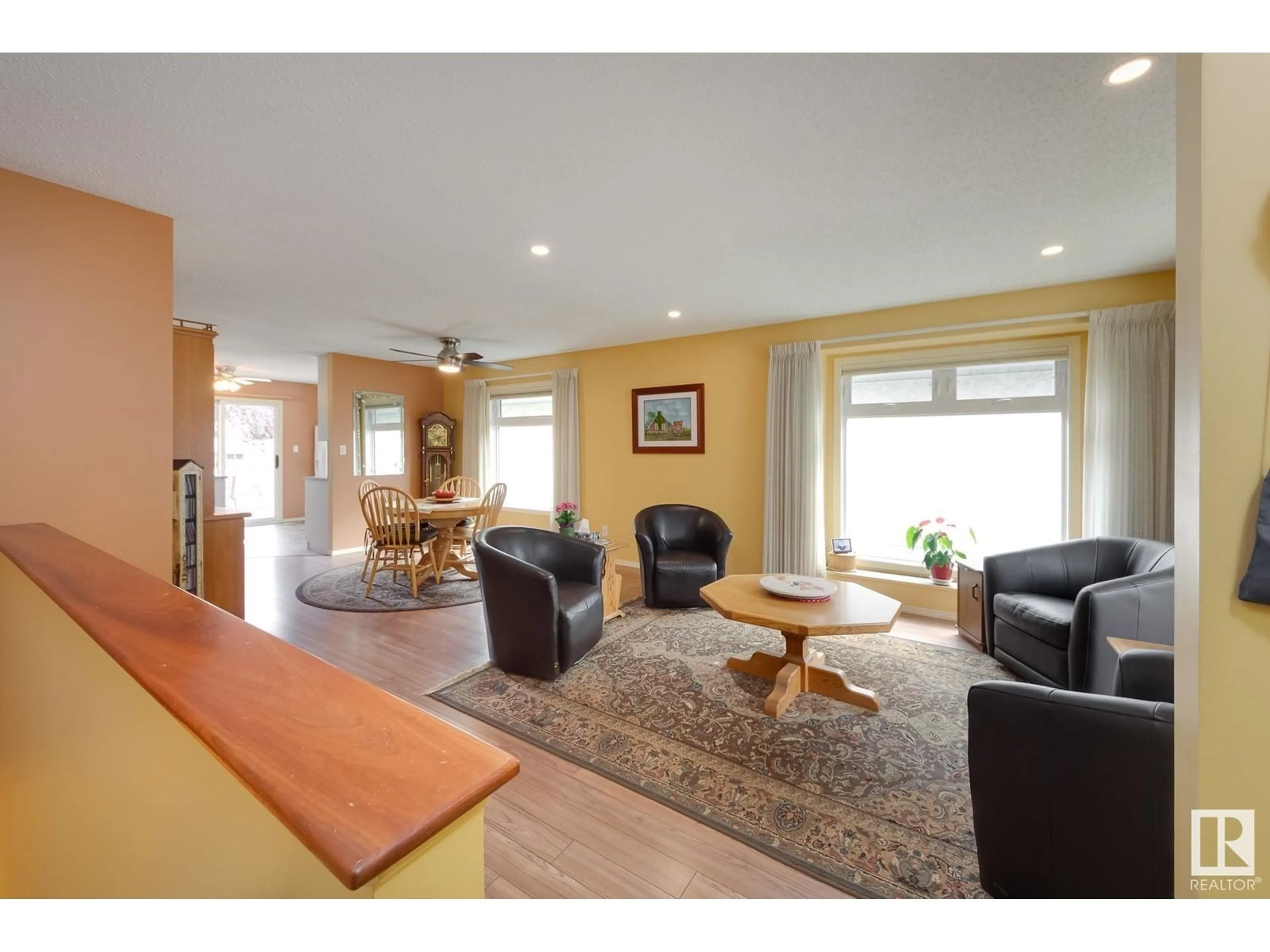 Living room with furniture, wood/laminate floor for 9119 GRANDIN RD, St. Albert Alberta T8N5N3