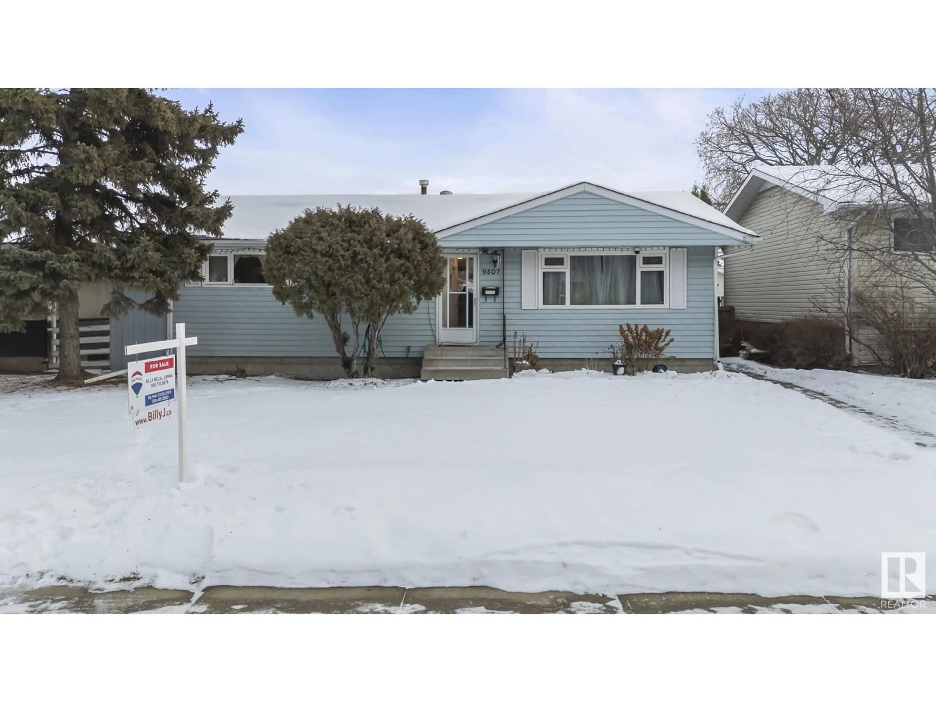 Home with vinyl exterior material, street for 9807 164 ST NW NW, Edmonton Alberta T5P3R1