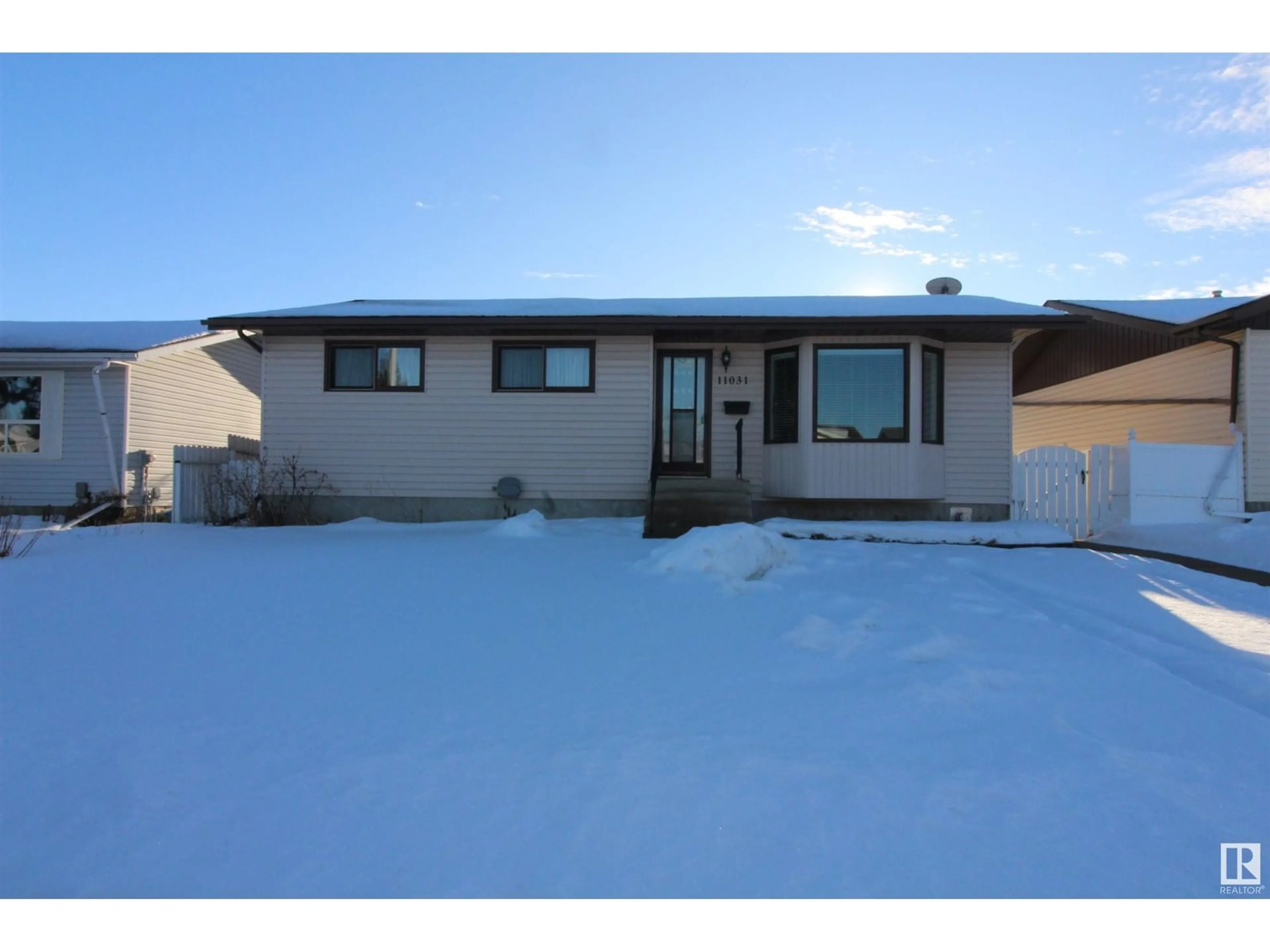 Home with vinyl exterior material, street for 11031 104 ST, Westlock Alberta T7P1G5