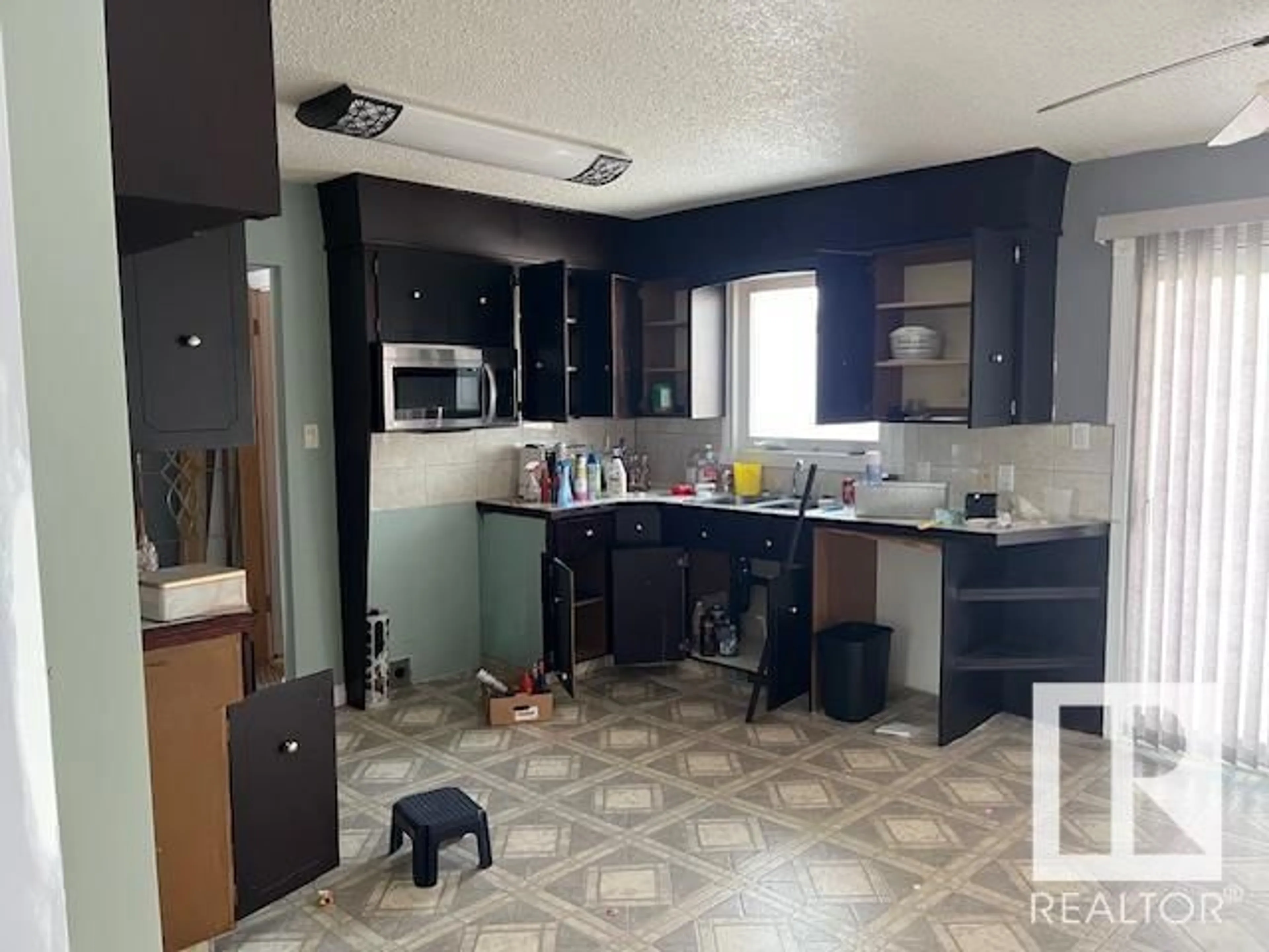 Open concept kitchen, ceramic/tile floor for 10424 110 AV, Westlock Alberta T7P1G2