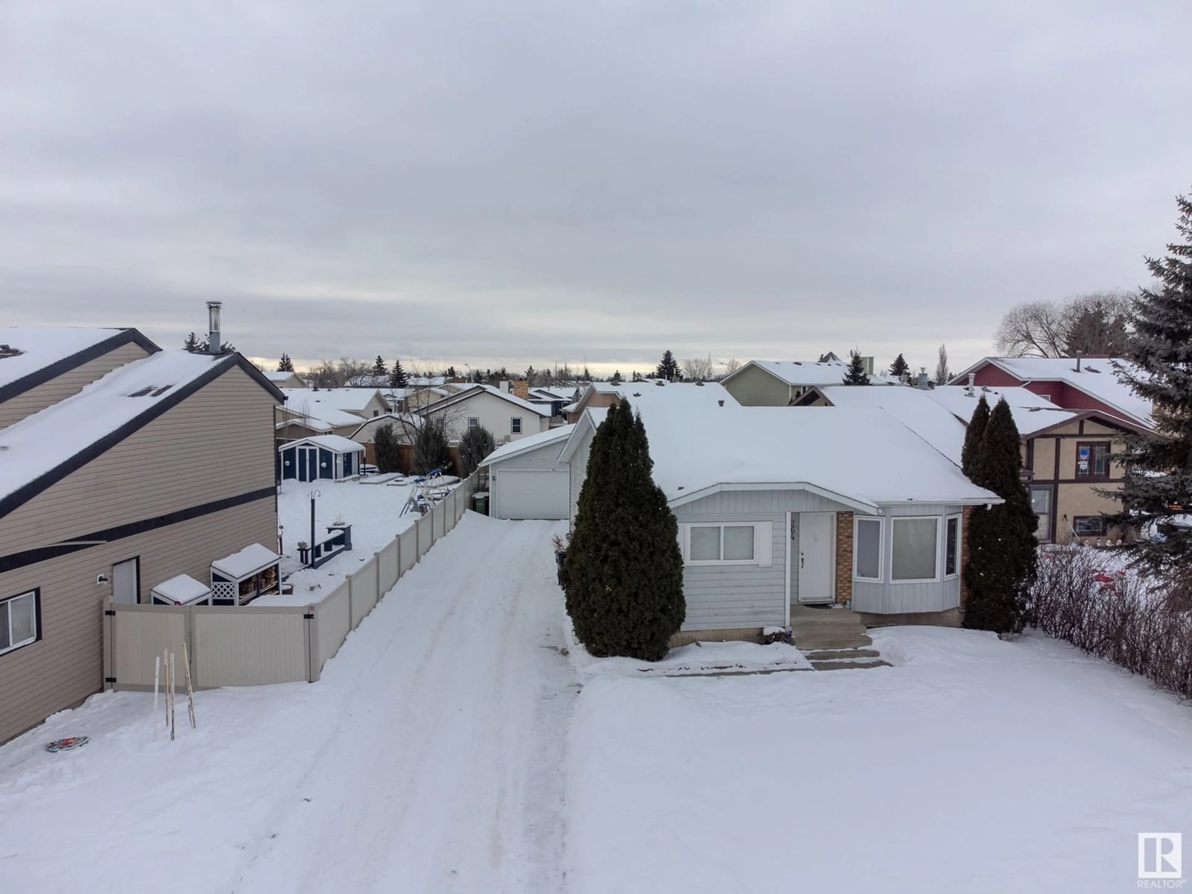 A pic from outside/outdoor area/front of a property/back of a property/a pic from drone, unknown for 264 DUNLUCE RD NW, Edmonton Alberta T5K4P3