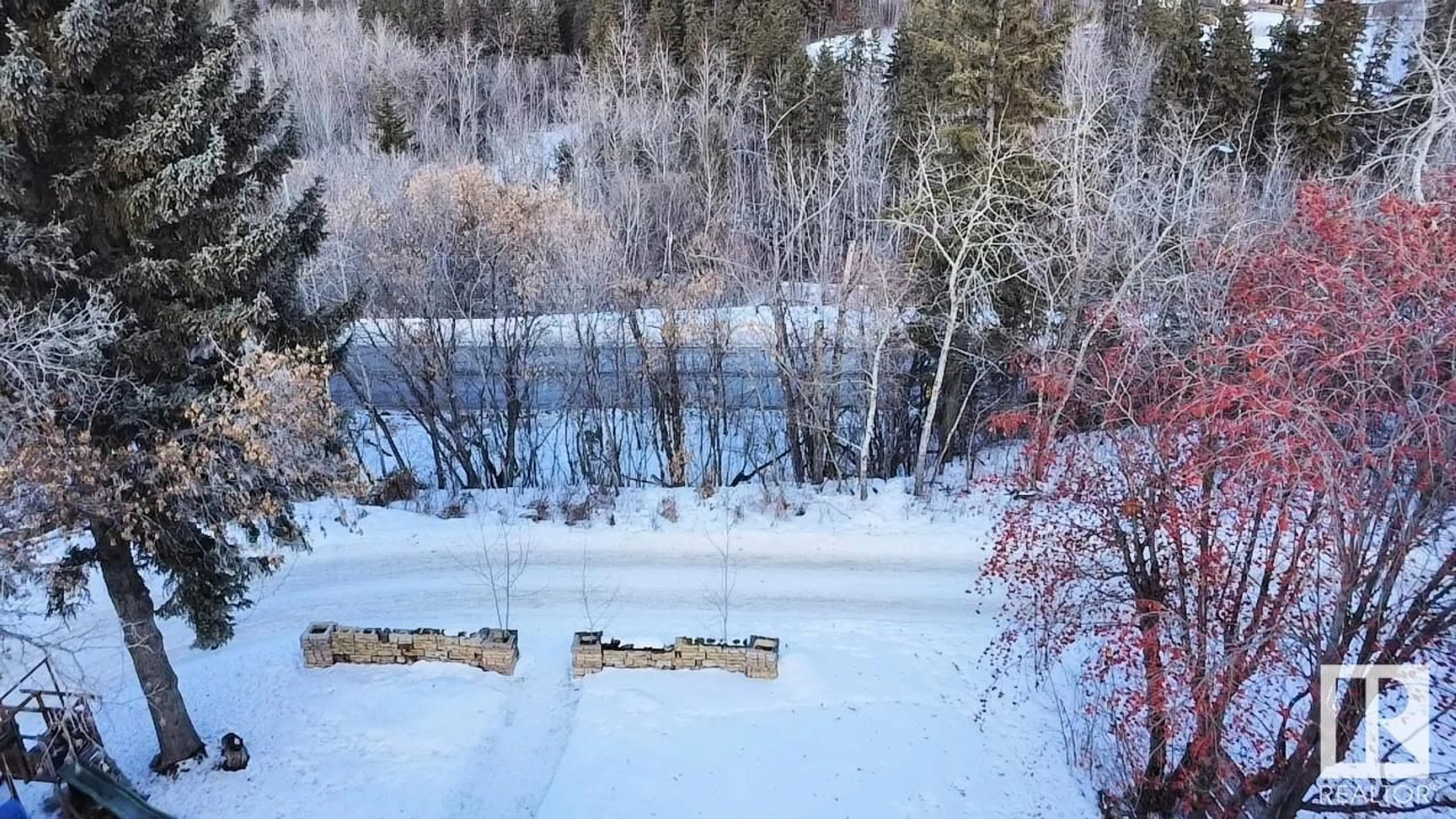 A pic from outside/outdoor area/front of a property/back of a property/a pic from drone, water/lake/river/ocean view for 9335 76 AV NW, Edmonton Alberta T6C0J8