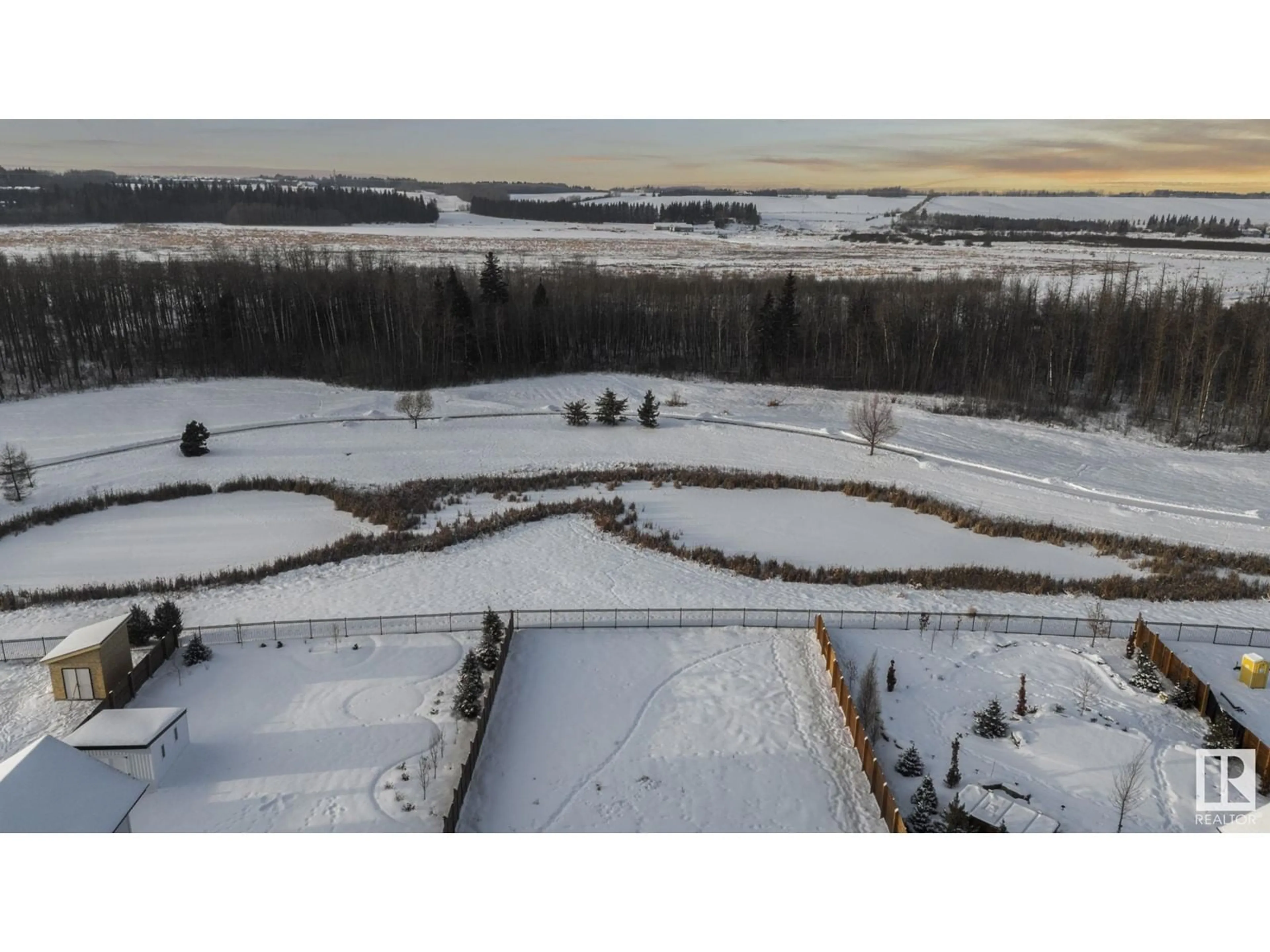 A pic from outside/outdoor area/front of a property/back of a property/a pic from drone, unknown for #80 25122 STURGEON RD, Rural Sturgeon County Alberta T8T1S6