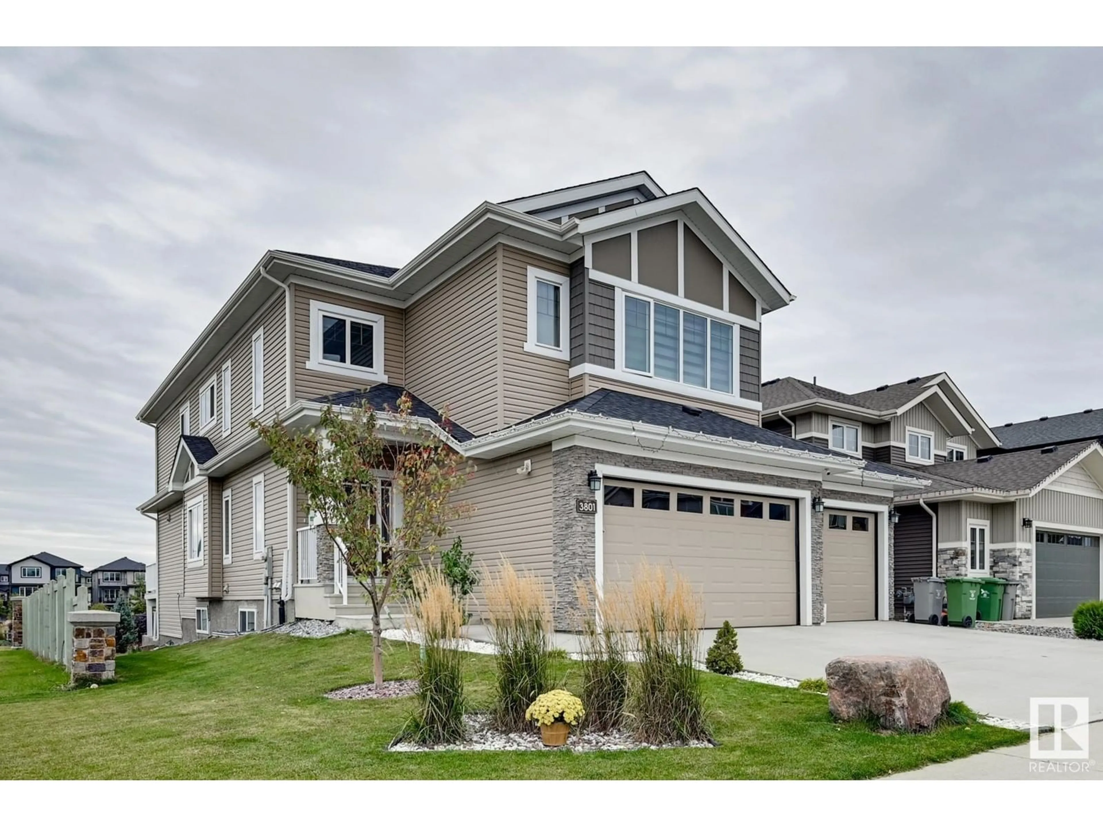 Home with vinyl exterior material, street for 3801 48 AV, Beaumont Alberta T4X1Y8