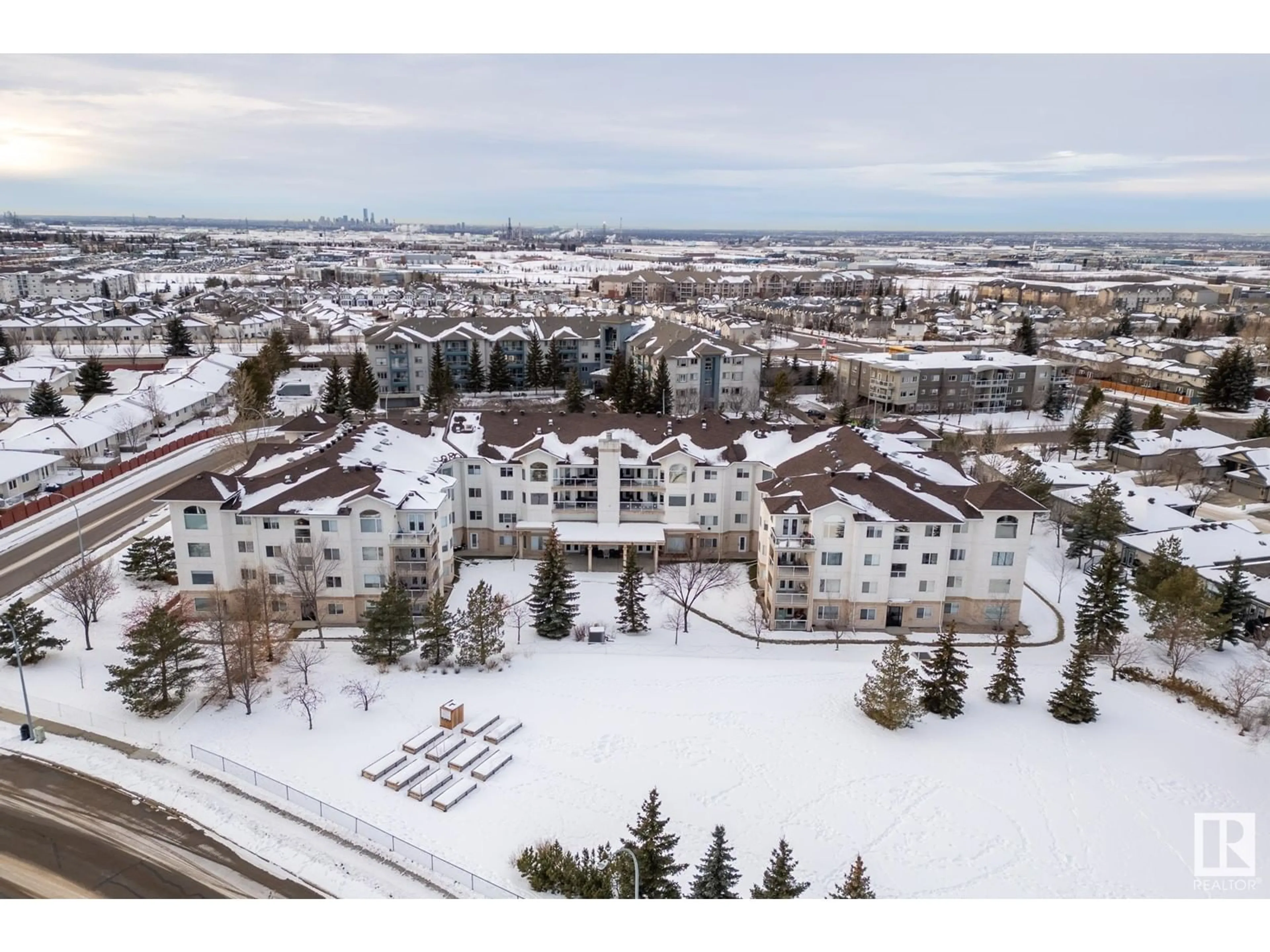 A pic from outside/outdoor area/front of a property/back of a property/a pic from drone, mountain view for #315 69 CRYSTAL LN, Sherwood Park Alberta T8H2T1