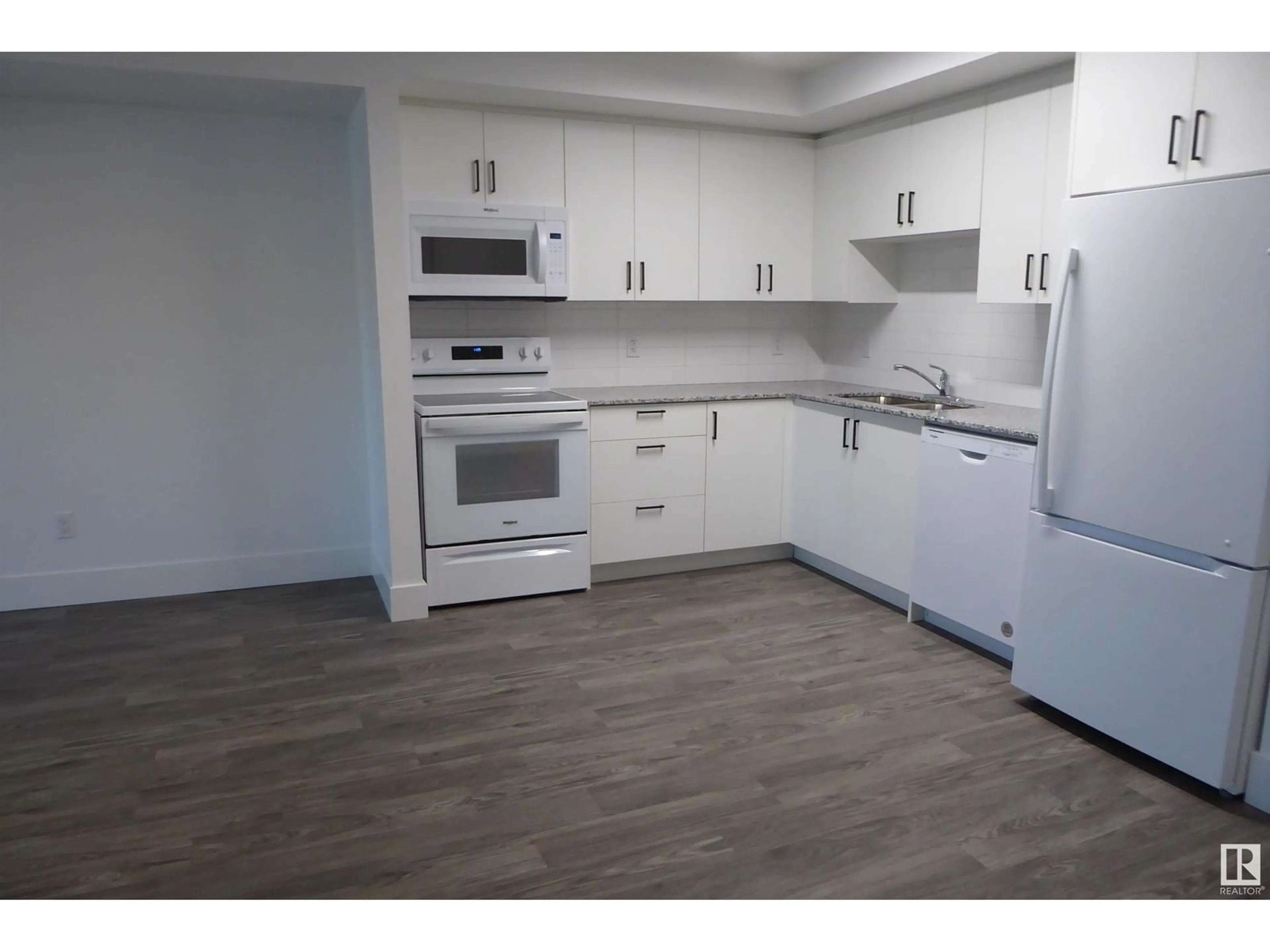 Standard kitchen, wood/laminate floor for #316 9504 182 ST NW NW, Edmonton Alberta T5T3A7