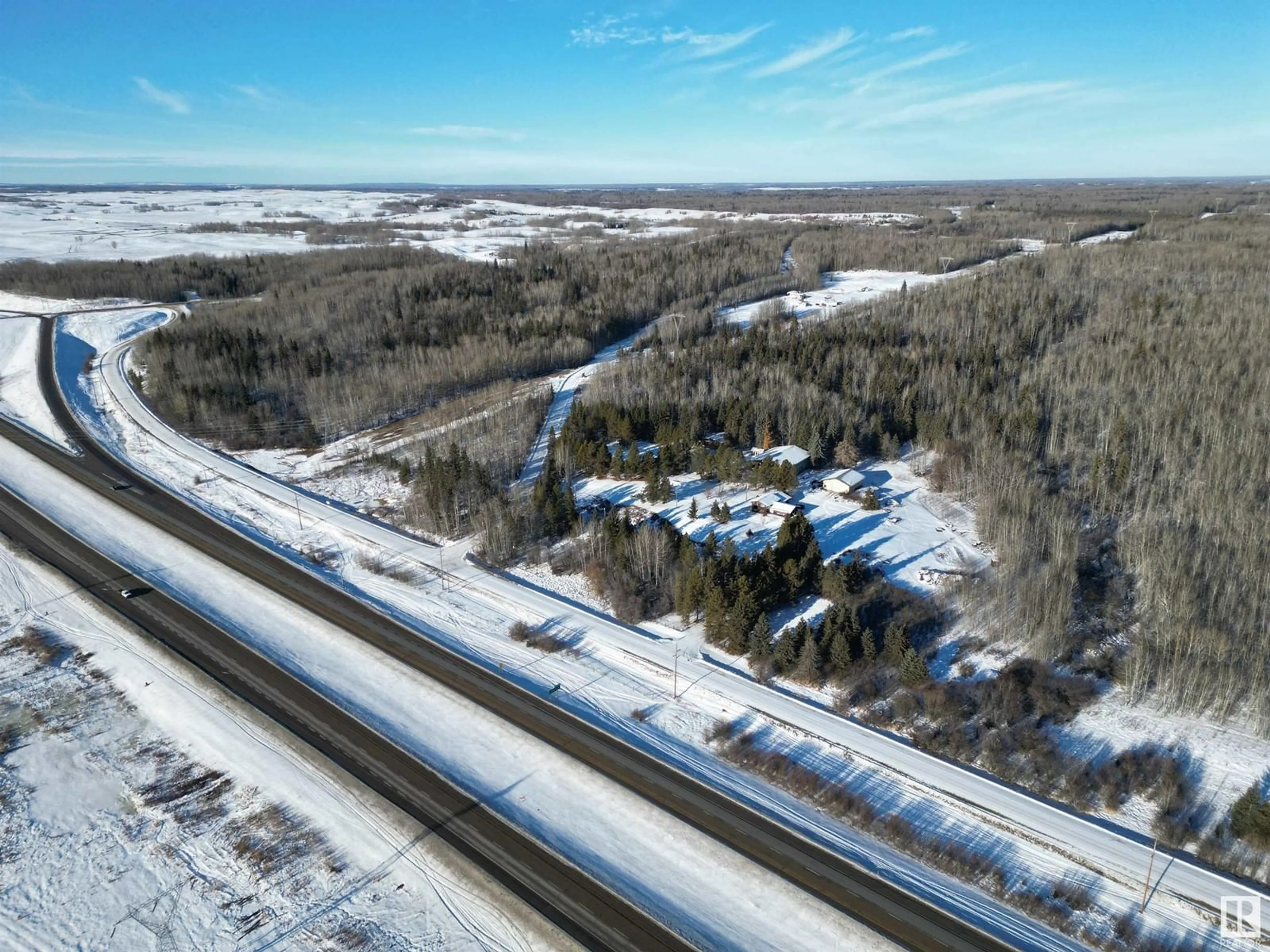A pic from outside/outdoor area/front of a property/back of a property/a pic from drone, street for 4012 HGHWAY 16, Rural Parkland County Alberta T0E2K0