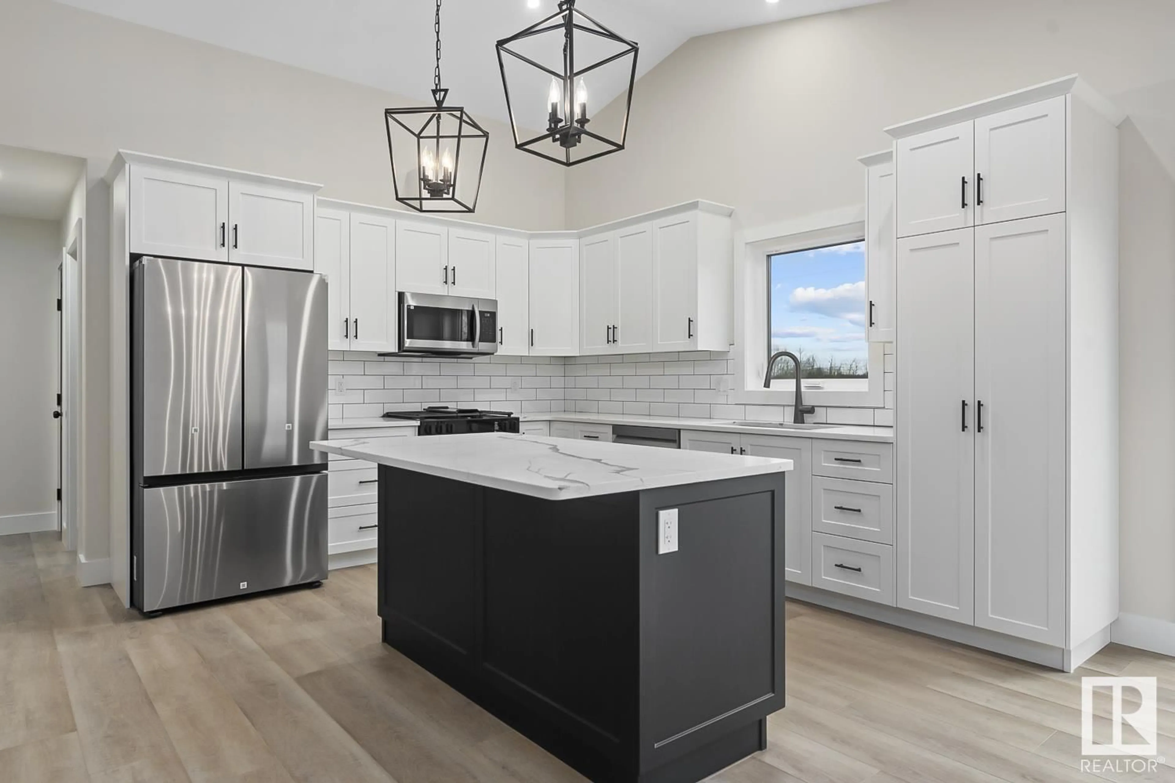 Open concept kitchen, ceramic/tile floor for 813 Schooner DR, Cold Lake Alberta T9M0L7