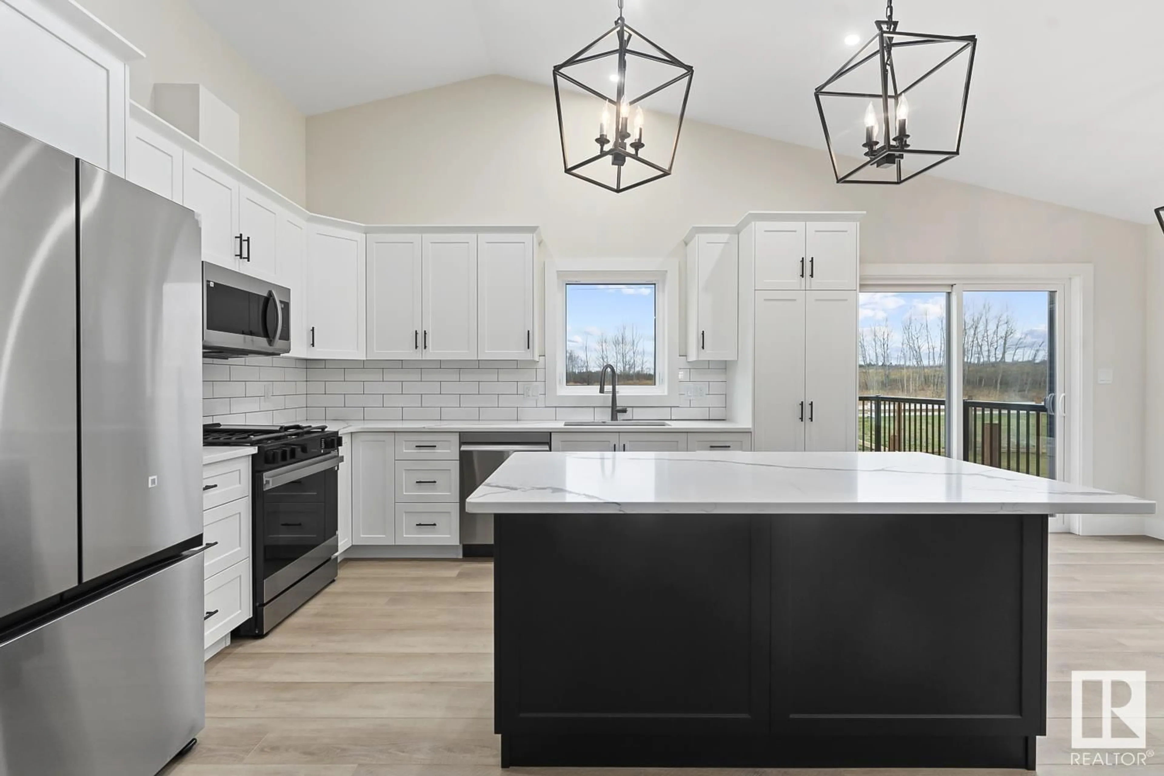 Open concept kitchen, ceramic/tile floor for 813 Schooner DR, Cold Lake Alberta T9M0L7