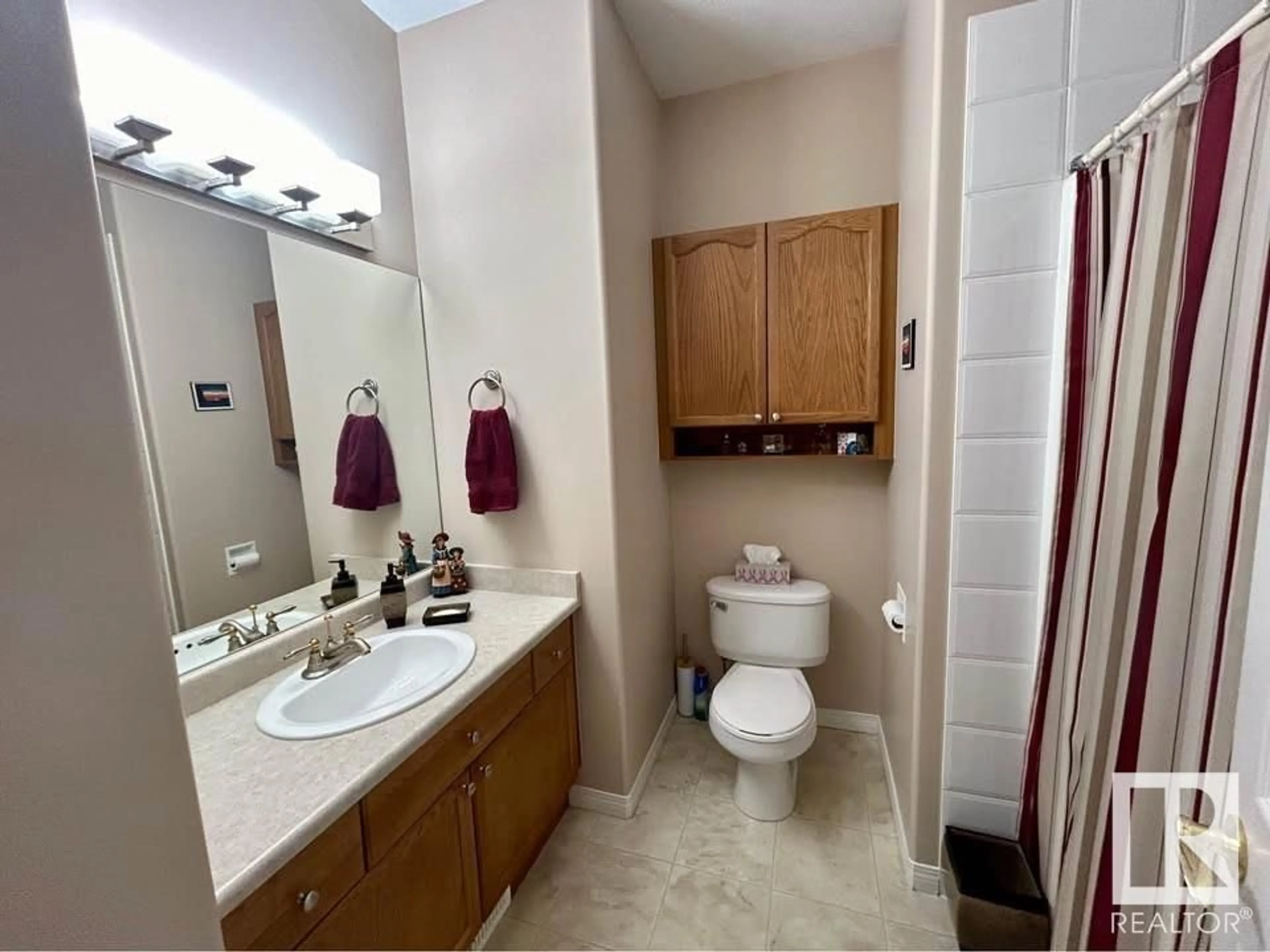 Standard bathroom, ceramic/tile floor for 321 RAVINE VI, Leduc Alberta T9E8H3