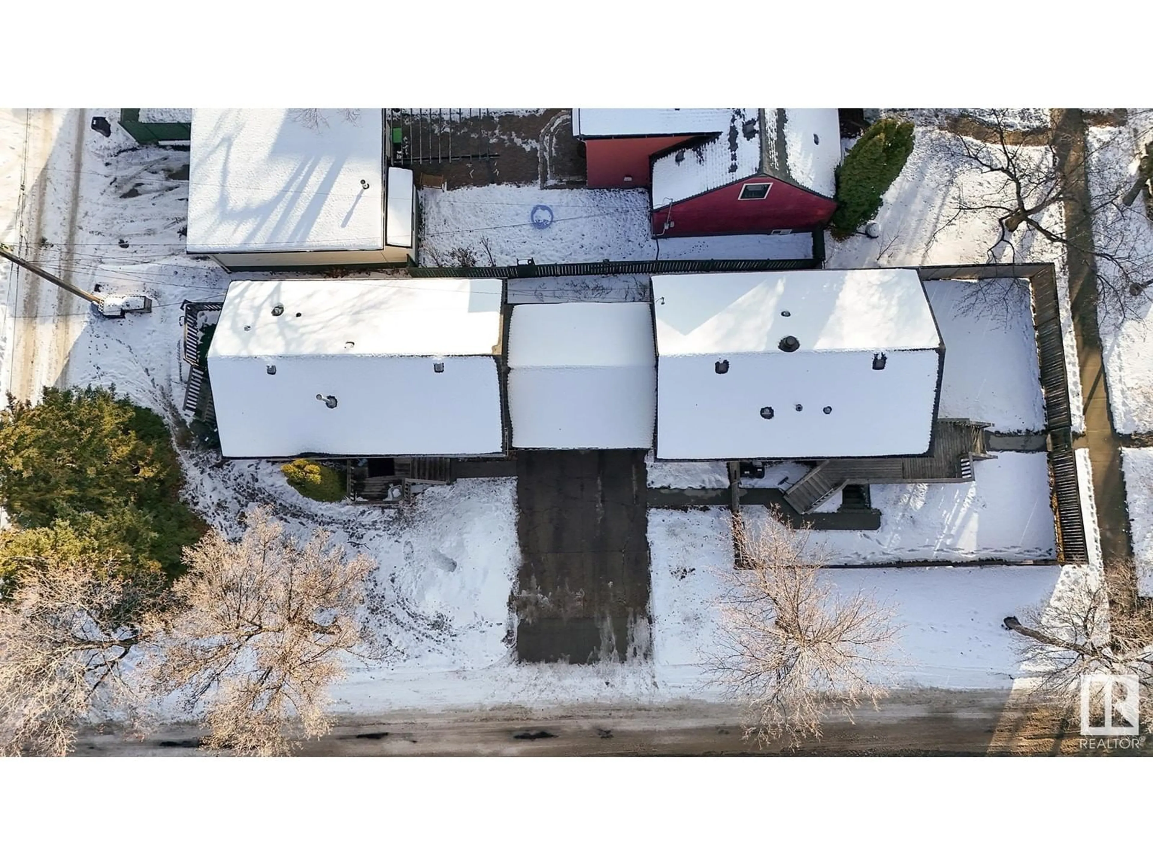 A pic from outside/outdoor area/front of a property/back of a property/a pic from drone, building for 14411 106 AV NW, Edmonton Alberta T5N3Z3