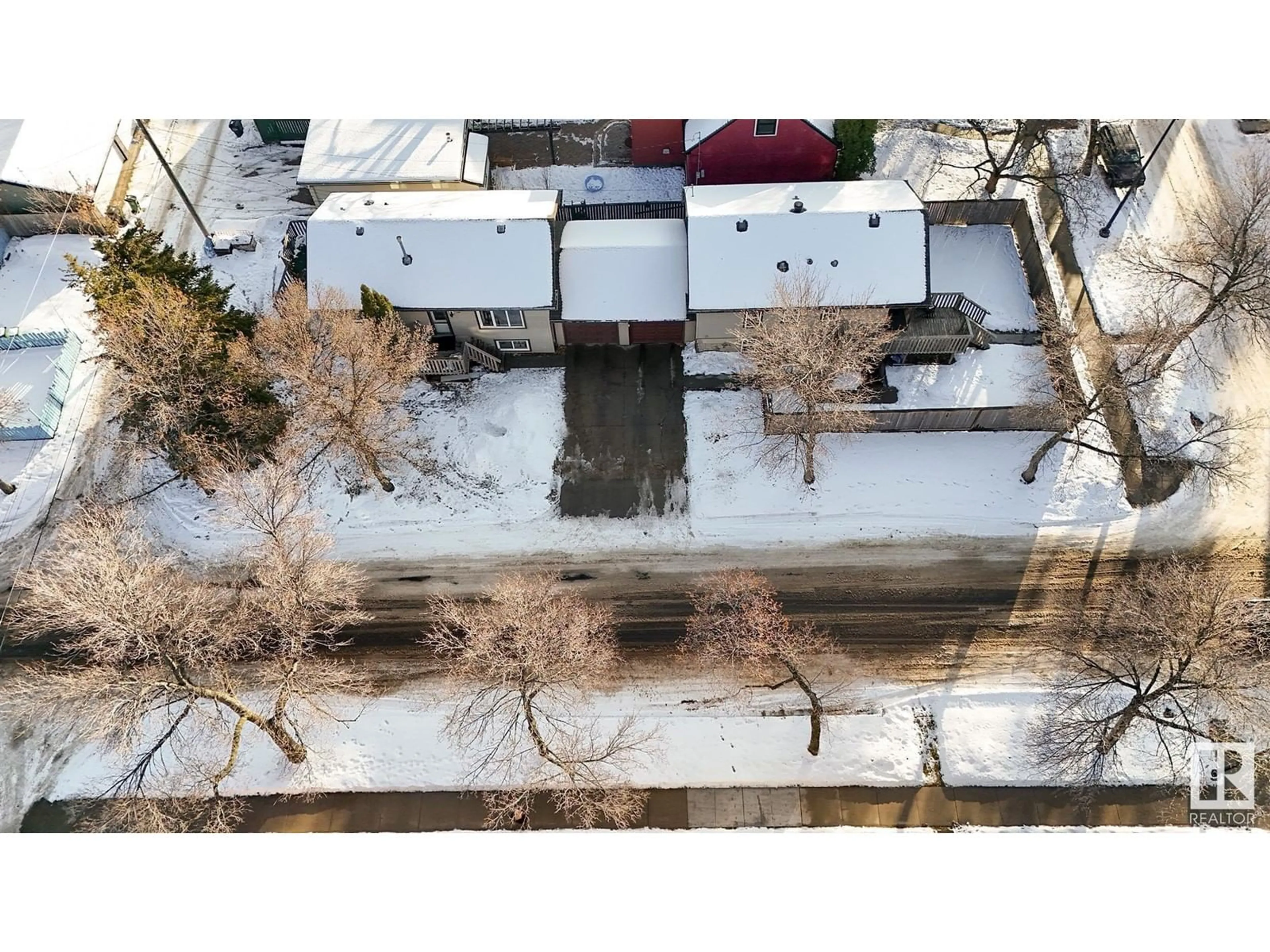 A pic from outside/outdoor area/front of a property/back of a property/a pic from drone, unknown for 14411 106 AV NW, Edmonton Alberta T5N3Z3