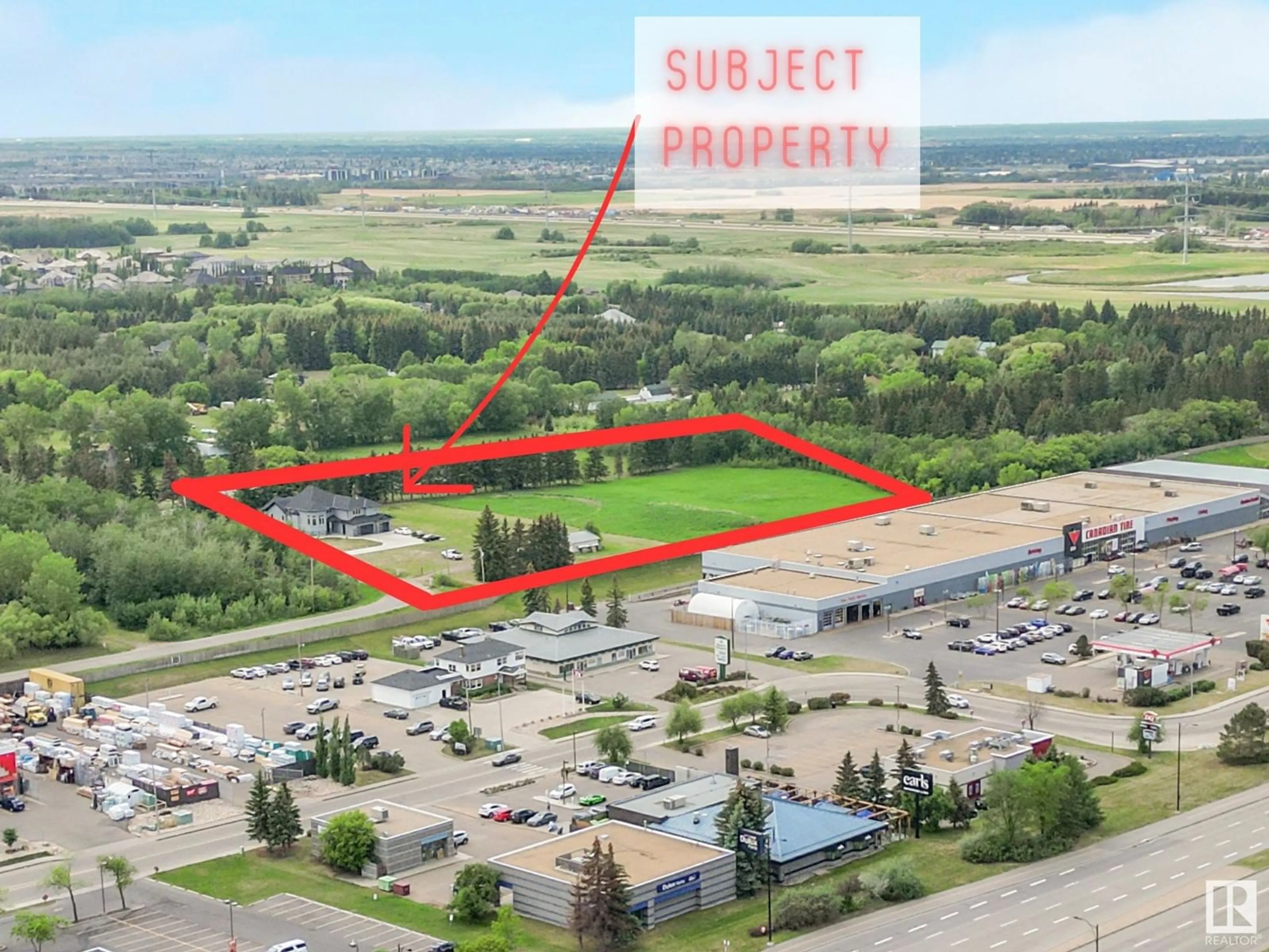 A pic from outside/outdoor area/front of a property/back of a property/a pic from drone, building for 12 52380 RGE RD 233, Rural Strathcona County Alberta T8B1E1