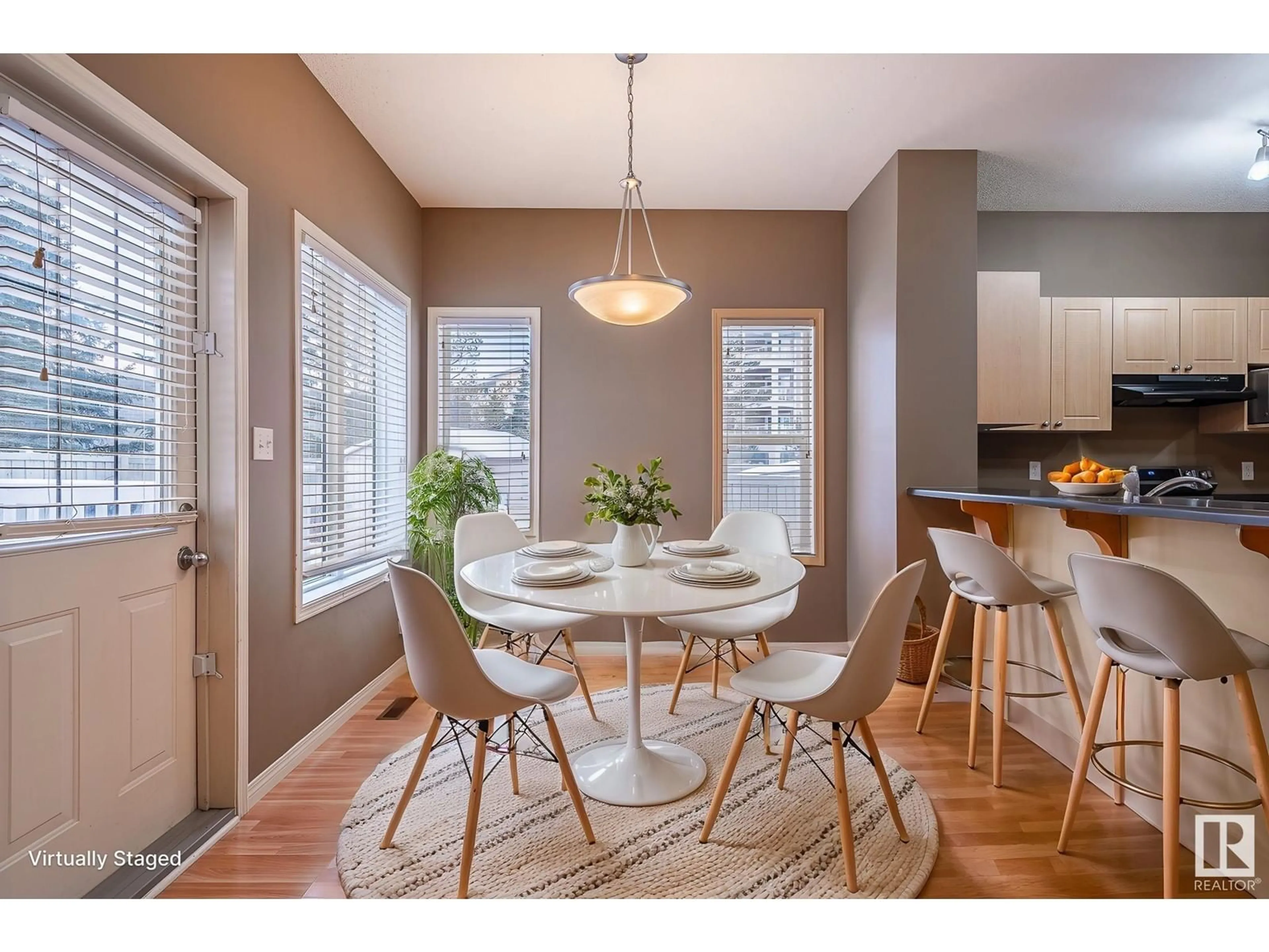 Dining room, wood/laminate floor for 3965 McMullen GR SW, Edmonton Alberta T6W1S7