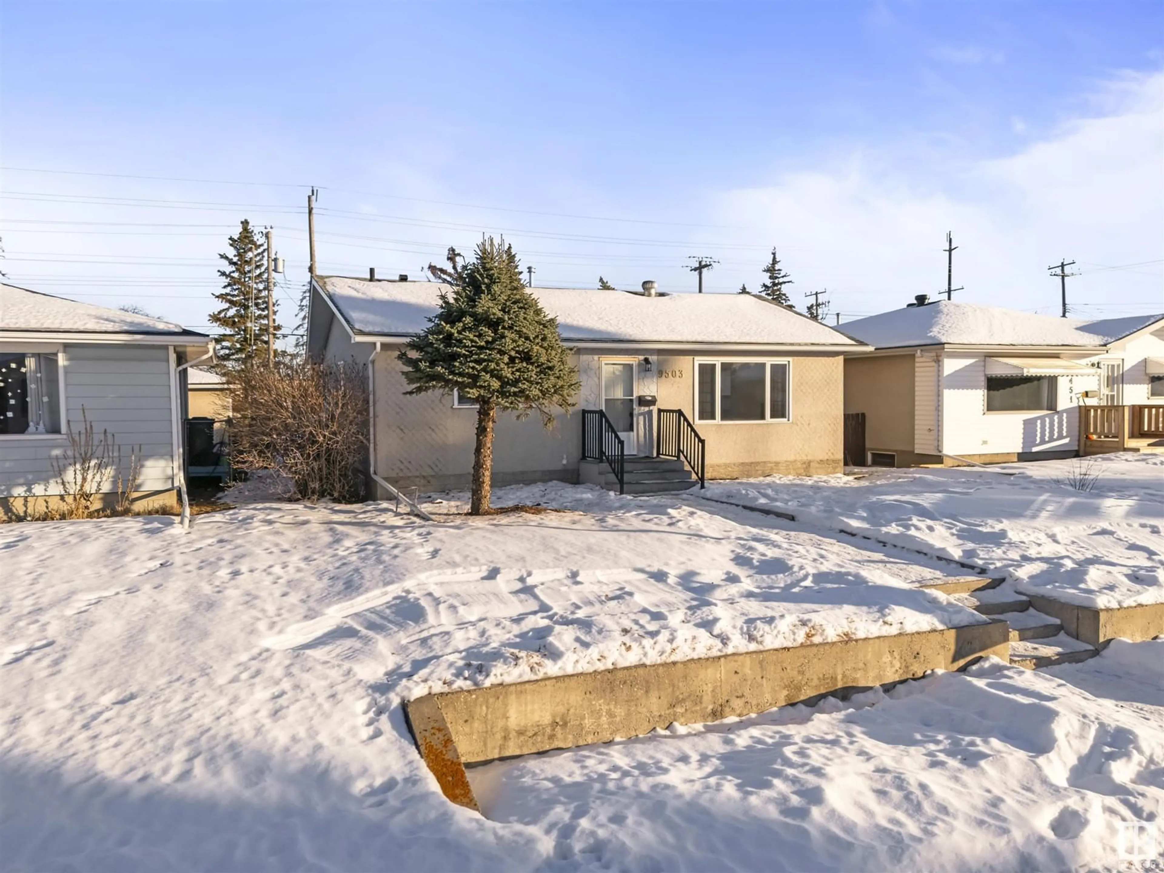 A pic from outside/outdoor area/front of a property/back of a property/a pic from drone, street for 9503 52 st NW, Edmonton Alberta T6B1G8