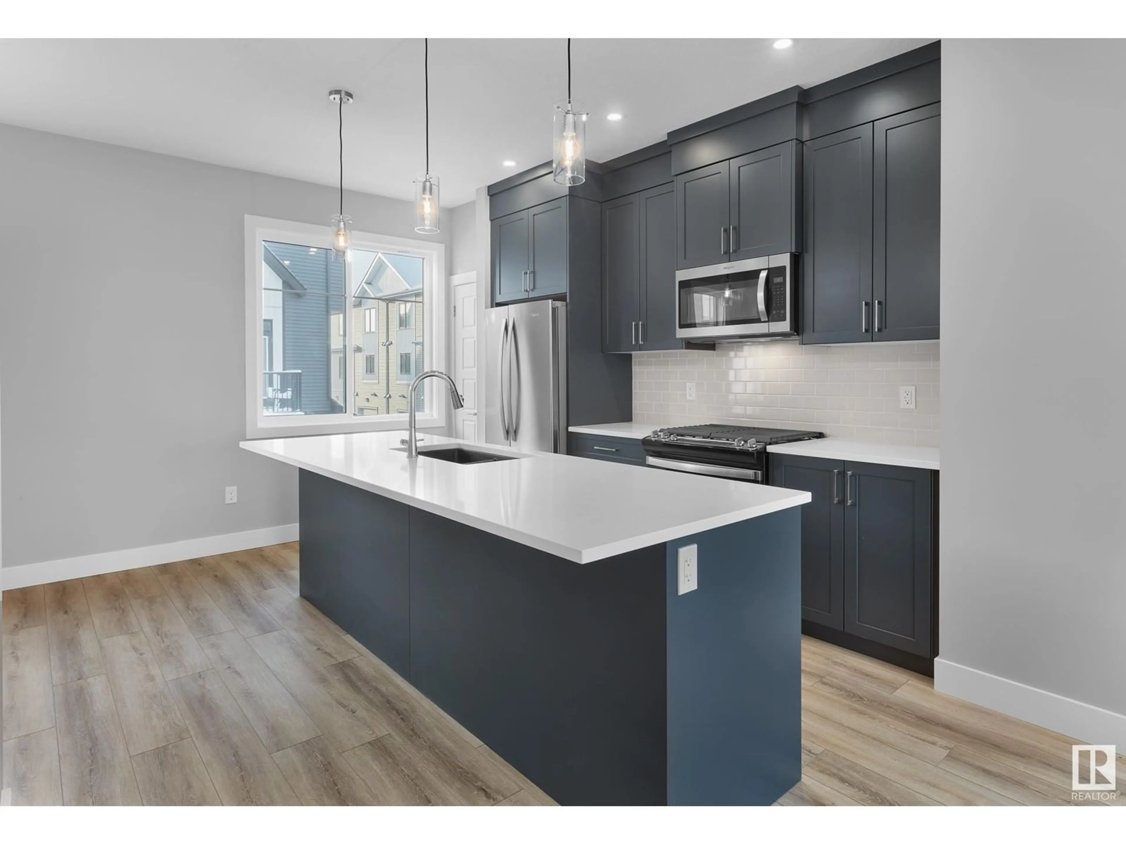 Open concept kitchen, unknown for #51 6905 25 AV SW, Edmonton Alberta T6X3B7