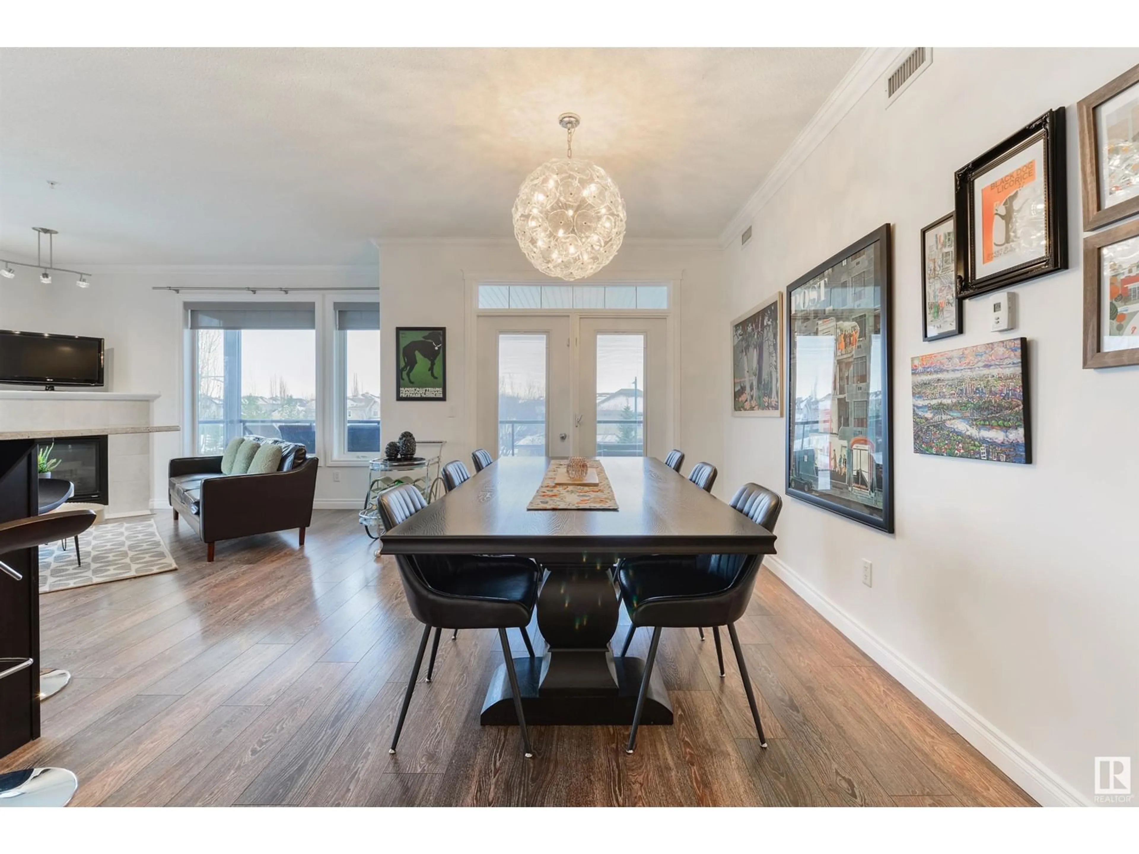 Dining room, wood/laminate floor for #309 12408 15 AV SW SW, Edmonton Alberta T6W1X2