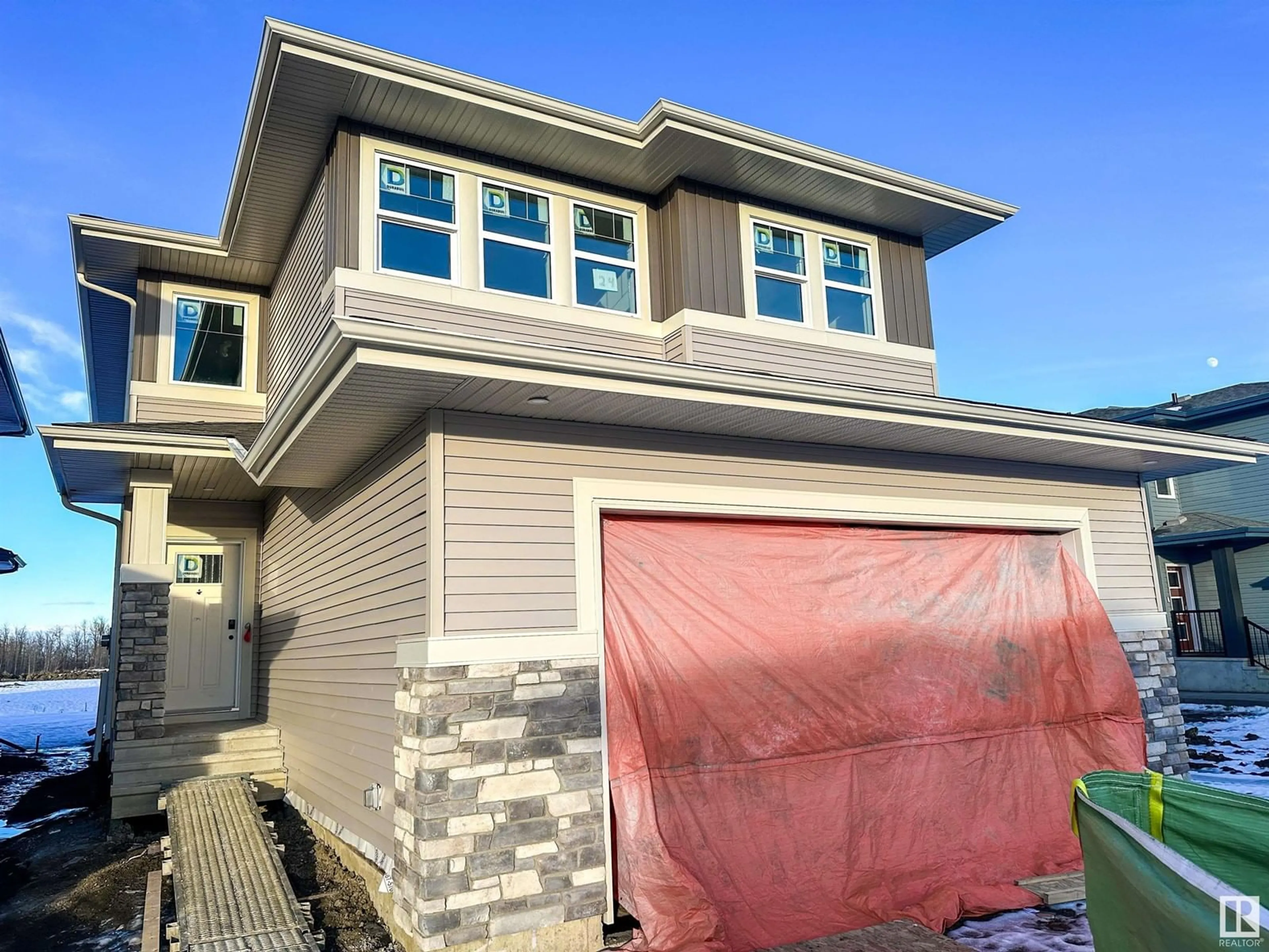 Home with vinyl exterior material, street for 24 ETON LI, Spruce Grove Alberta T7X4A9