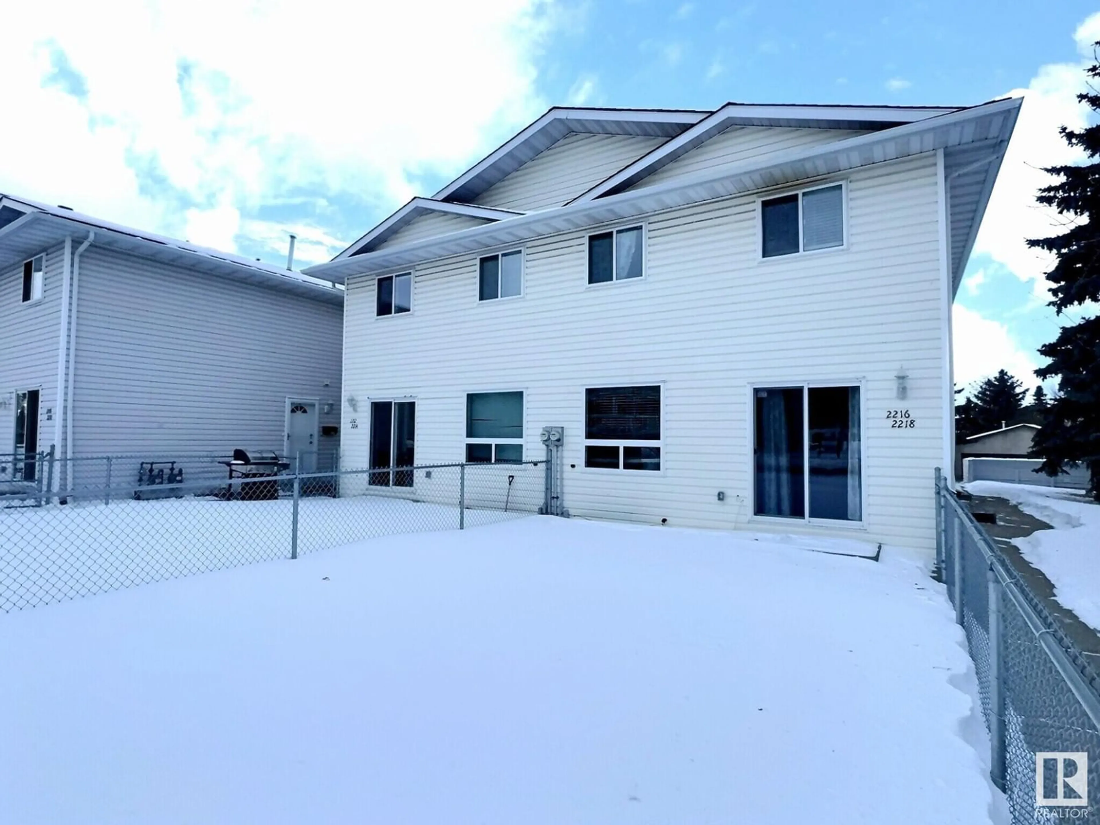 A pic from outside/outdoor area/front of a property/back of a property/a pic from drone, building for 2216 38 ST NW, Edmonton Alberta T6L4C3