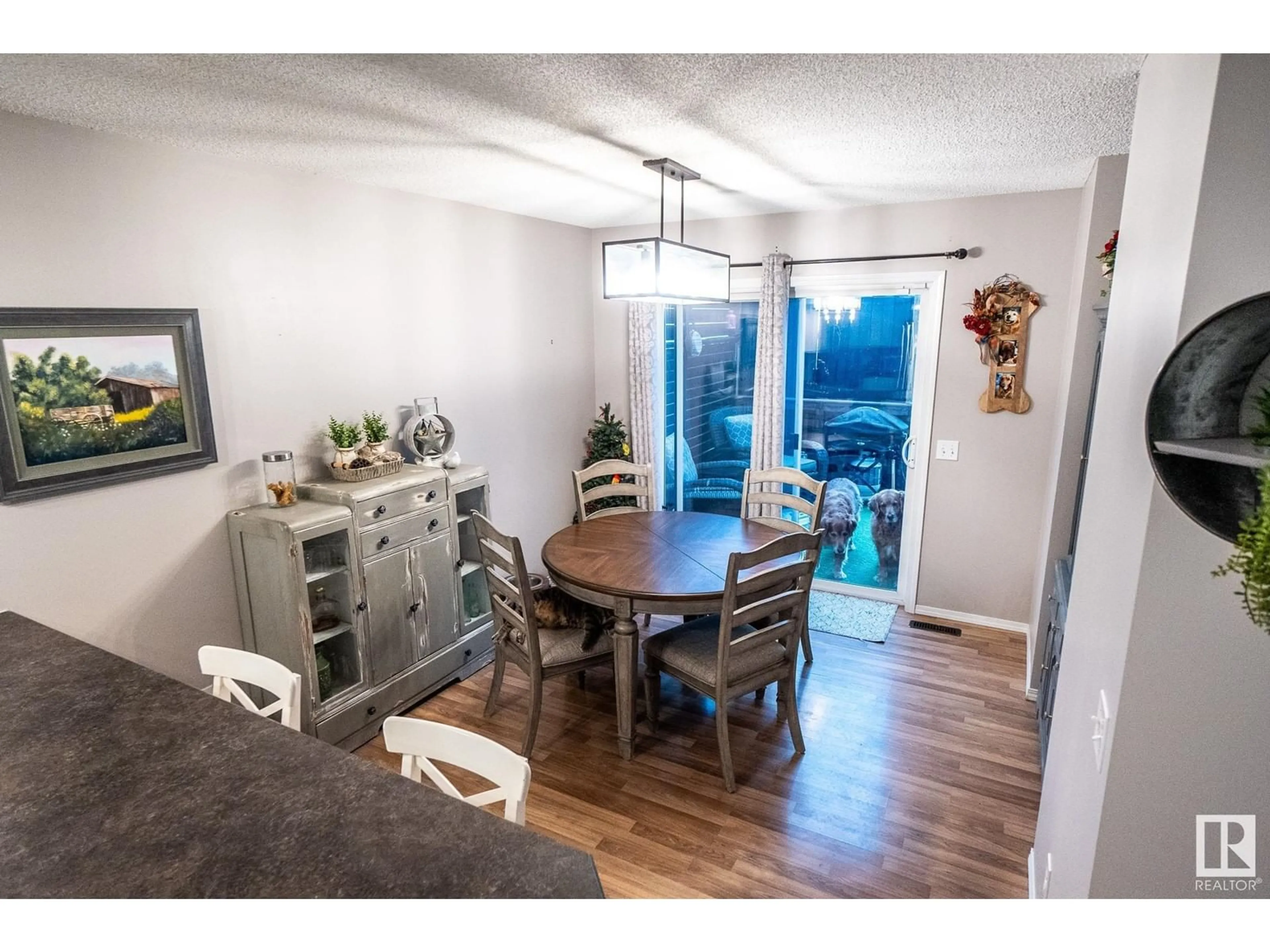 Dining room, wood/laminate floor for 3112 48 St, Beaumont Alberta T4X1V1