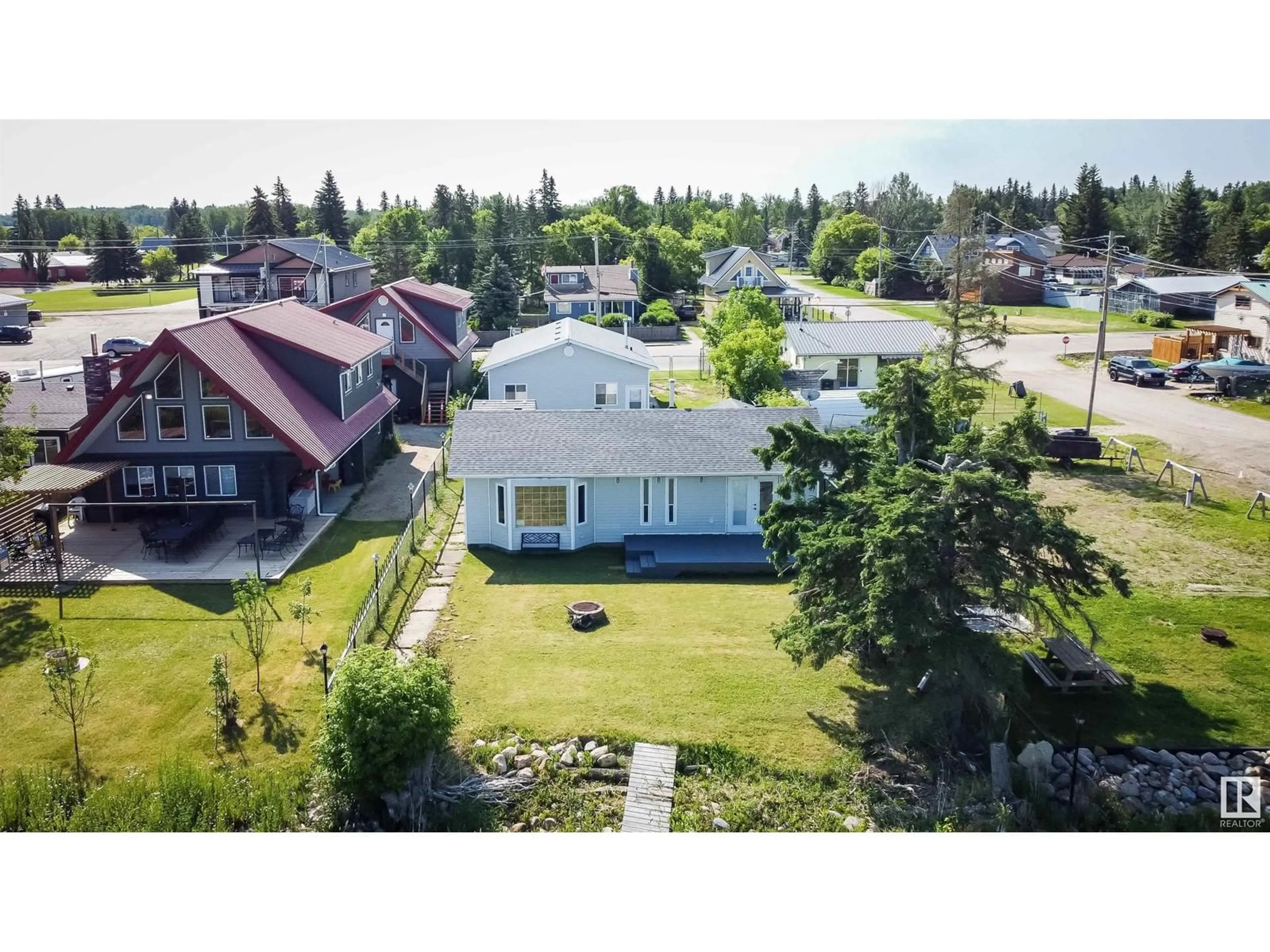 A pic from outside/outdoor area/front of a property/back of a property/a pic from drone, street for 5036 50 AV, Rural Lac Ste. Anne County Alberta T0E0A0