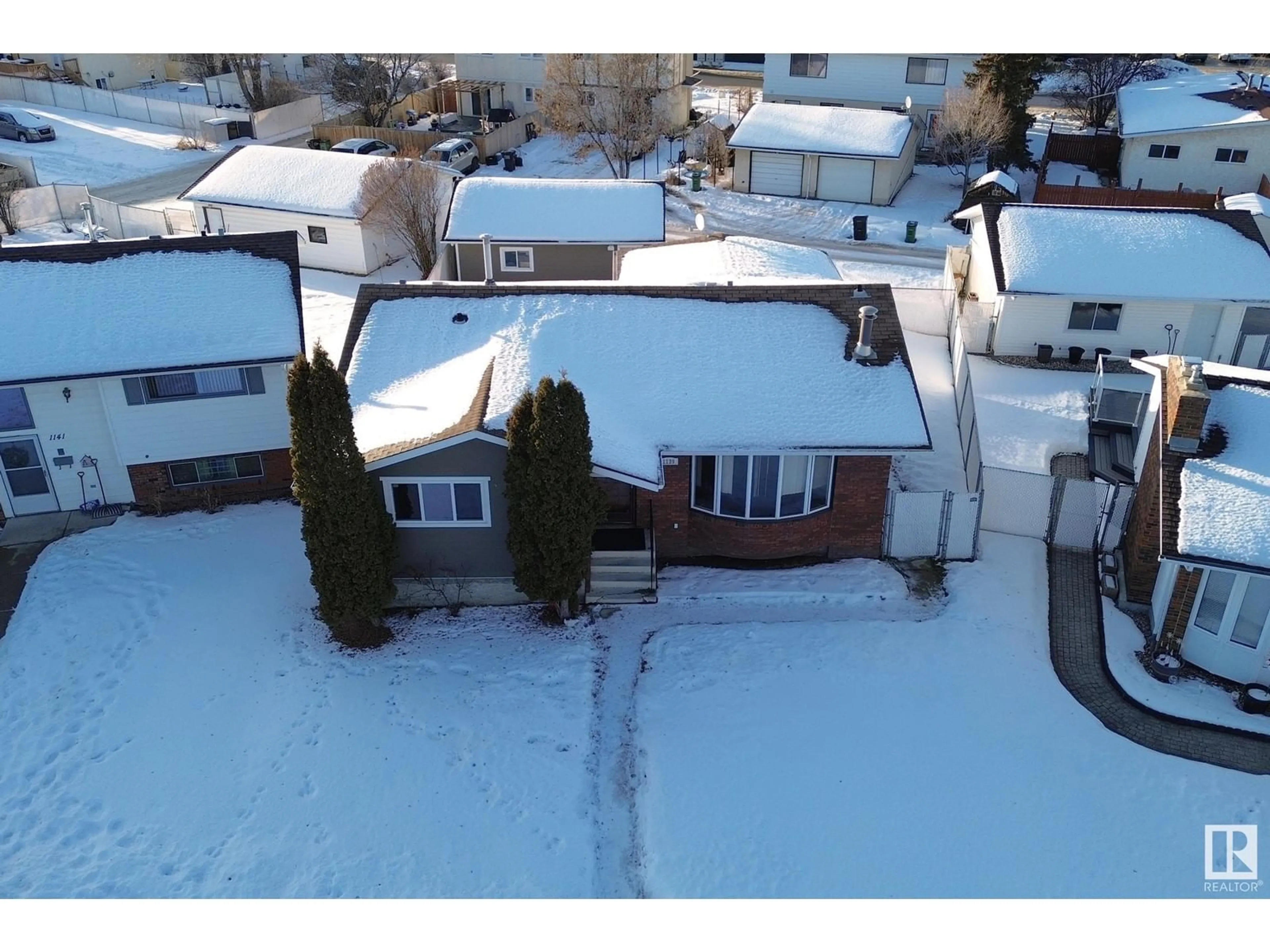 A pic from outside/outdoor area/front of a property/back of a property/a pic from drone, street for 1139 Lakewood Road North NW, Edmonton Alberta T6K3A9