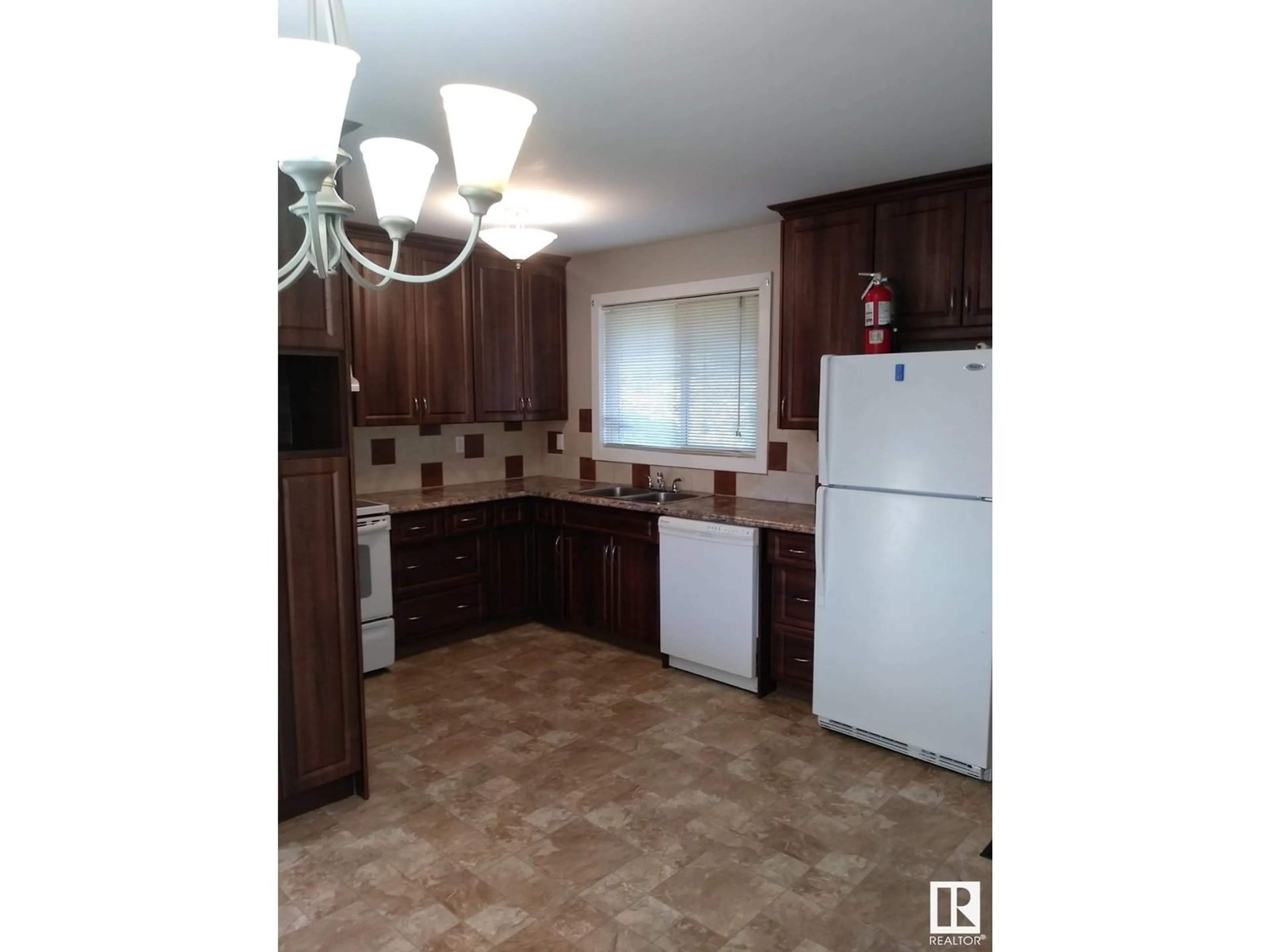 Standard kitchen, ceramic/tile floor for 3409 Erickson DR, Camrose Alberta T4V3X1