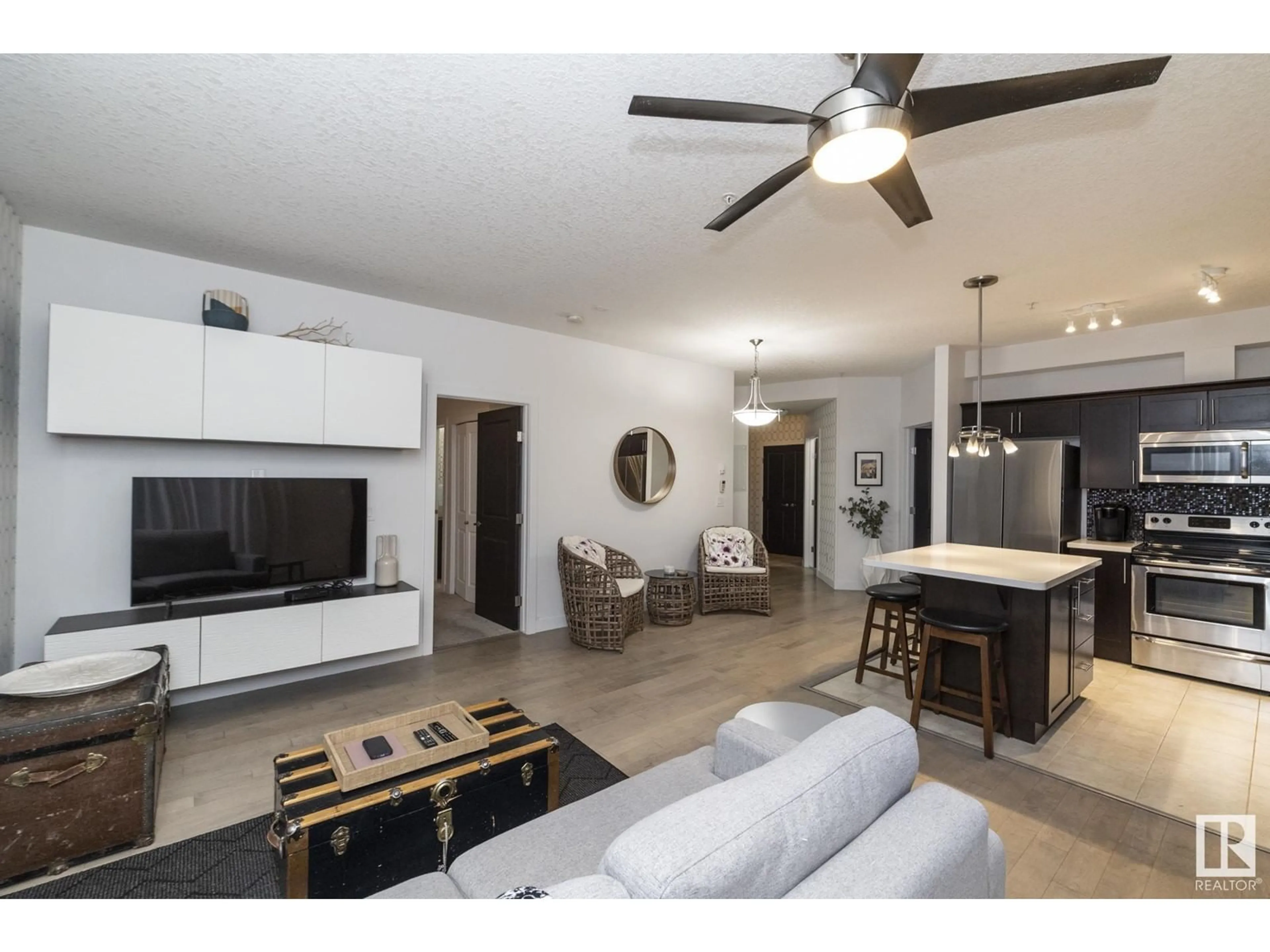 Living room with furniture, unknown for #106 2584 ANDERSON WY SW SW, Edmonton Alberta T6W0R2