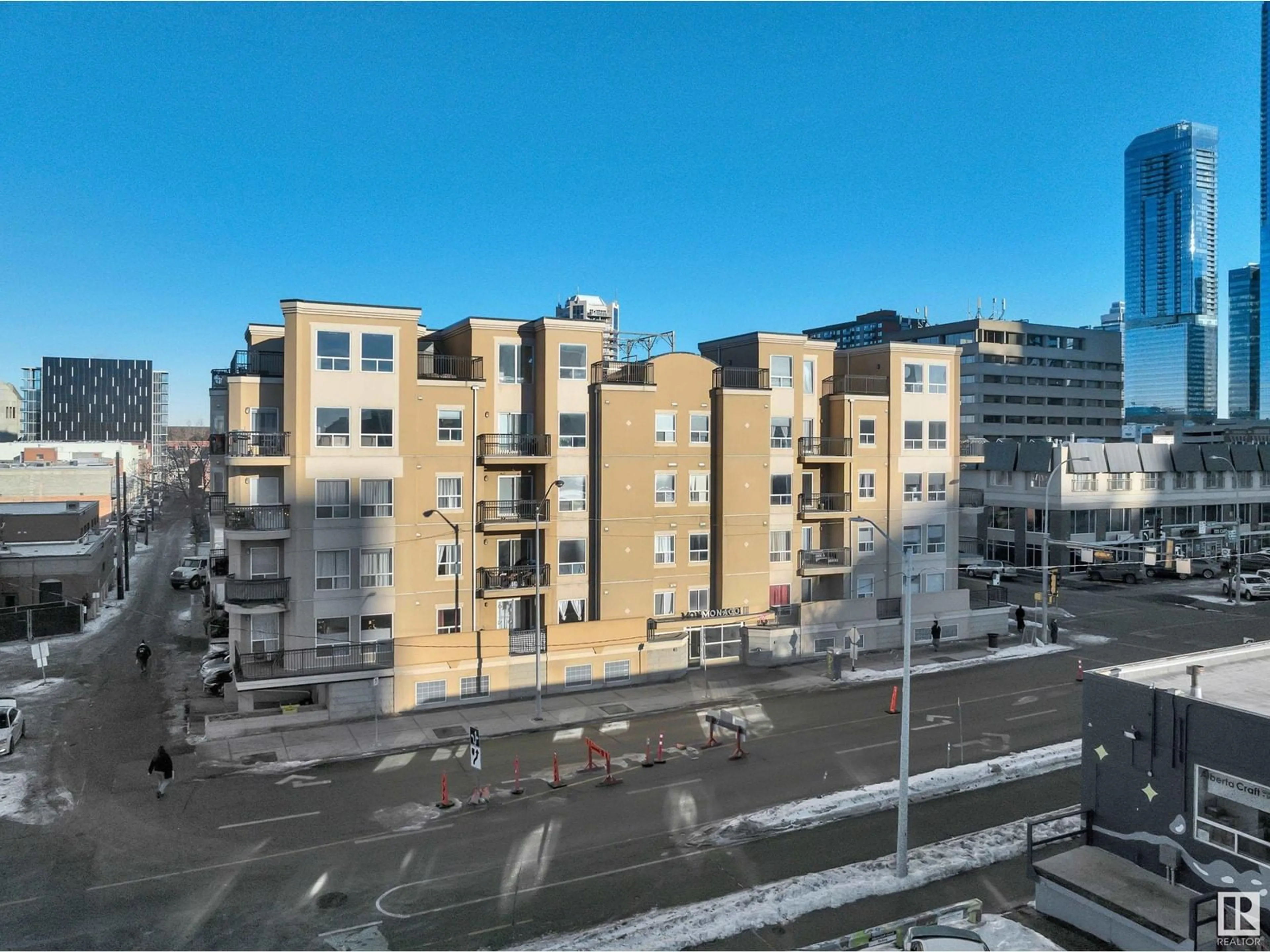 A pic from outside/outdoor area/front of a property/back of a property/a pic from drone, city buildings view from balcony for #402 10606 102 AV NW, Edmonton Alberta T5J5E9