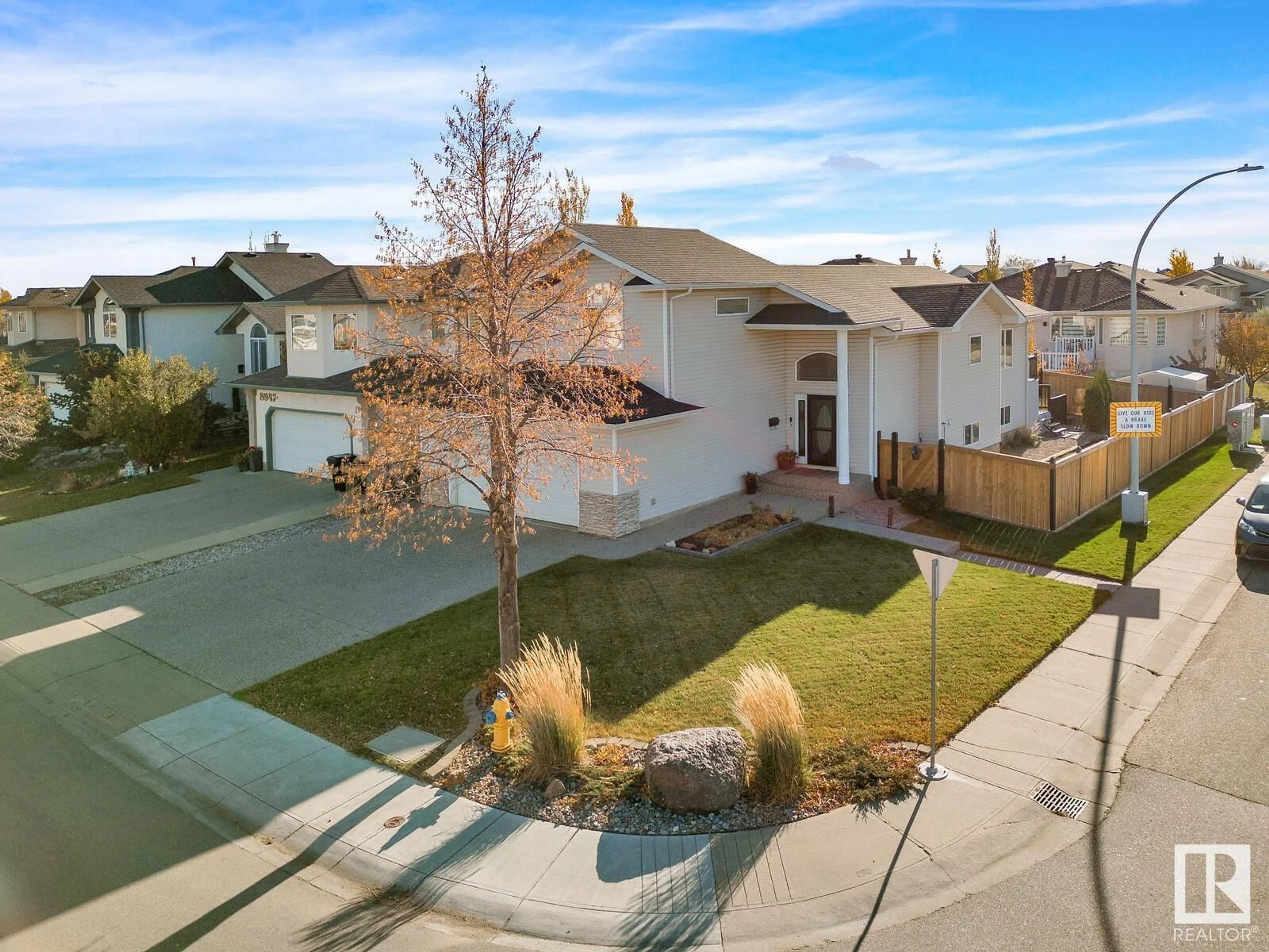 A pic from outside/outdoor area/front of a property/back of a property/a pic from drone, street for 8951 160 AV NW, Edmonton Alberta T5Z3J2