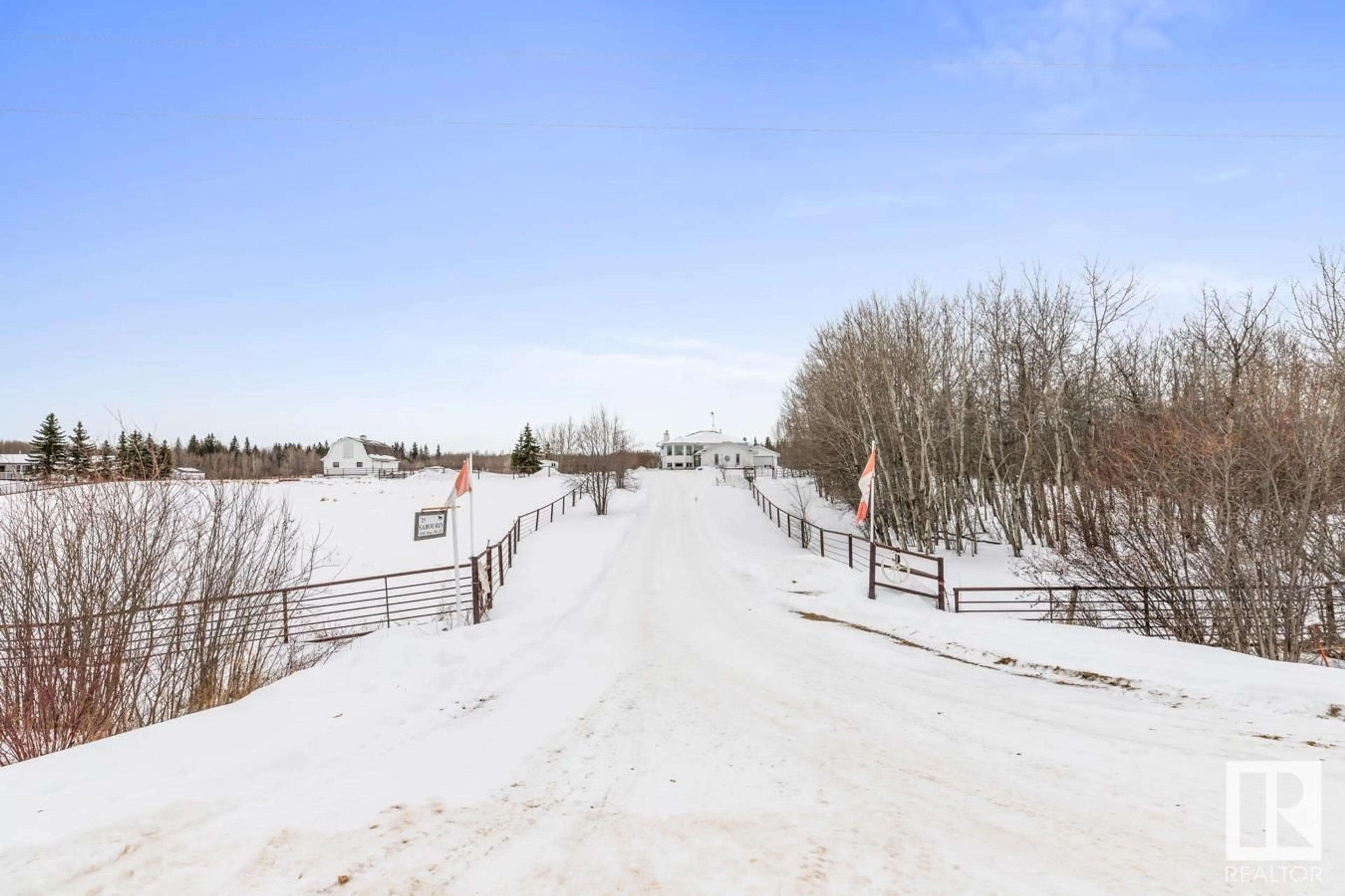 A pic from outside/outdoor area/front of a property/back of a property/a pic from drone, street for #25 51047 RR 221, Rural Strathcona County Alberta T8E1G8